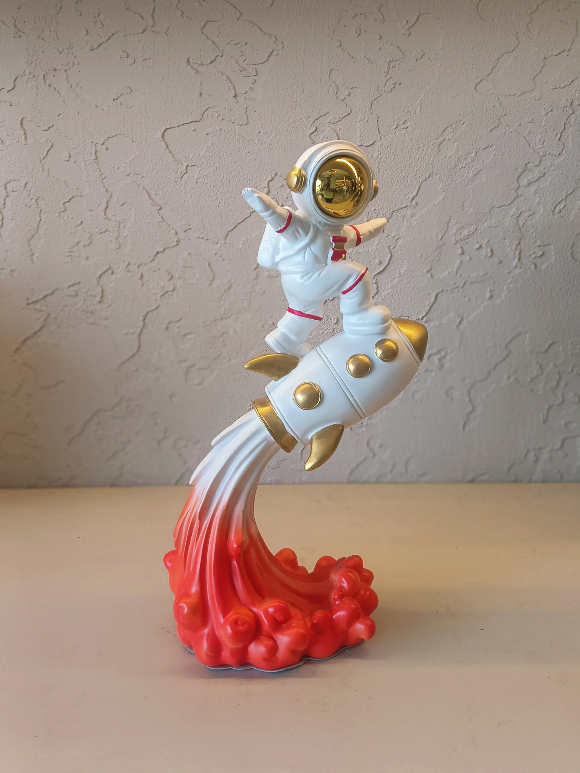 Astronaut Riding On Rocket