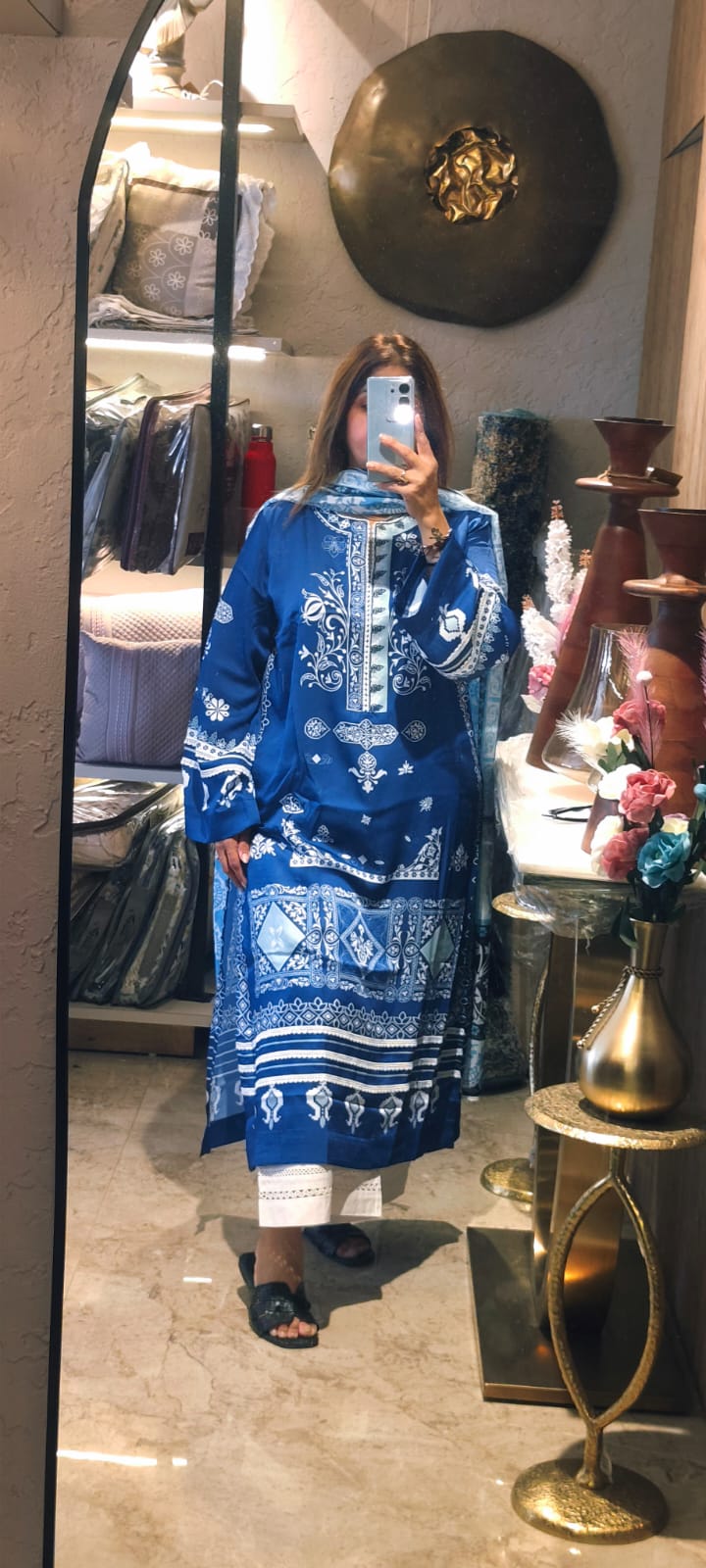 A Vibrant Blue Kurta With White Printed Ornamental And Floral Motifs