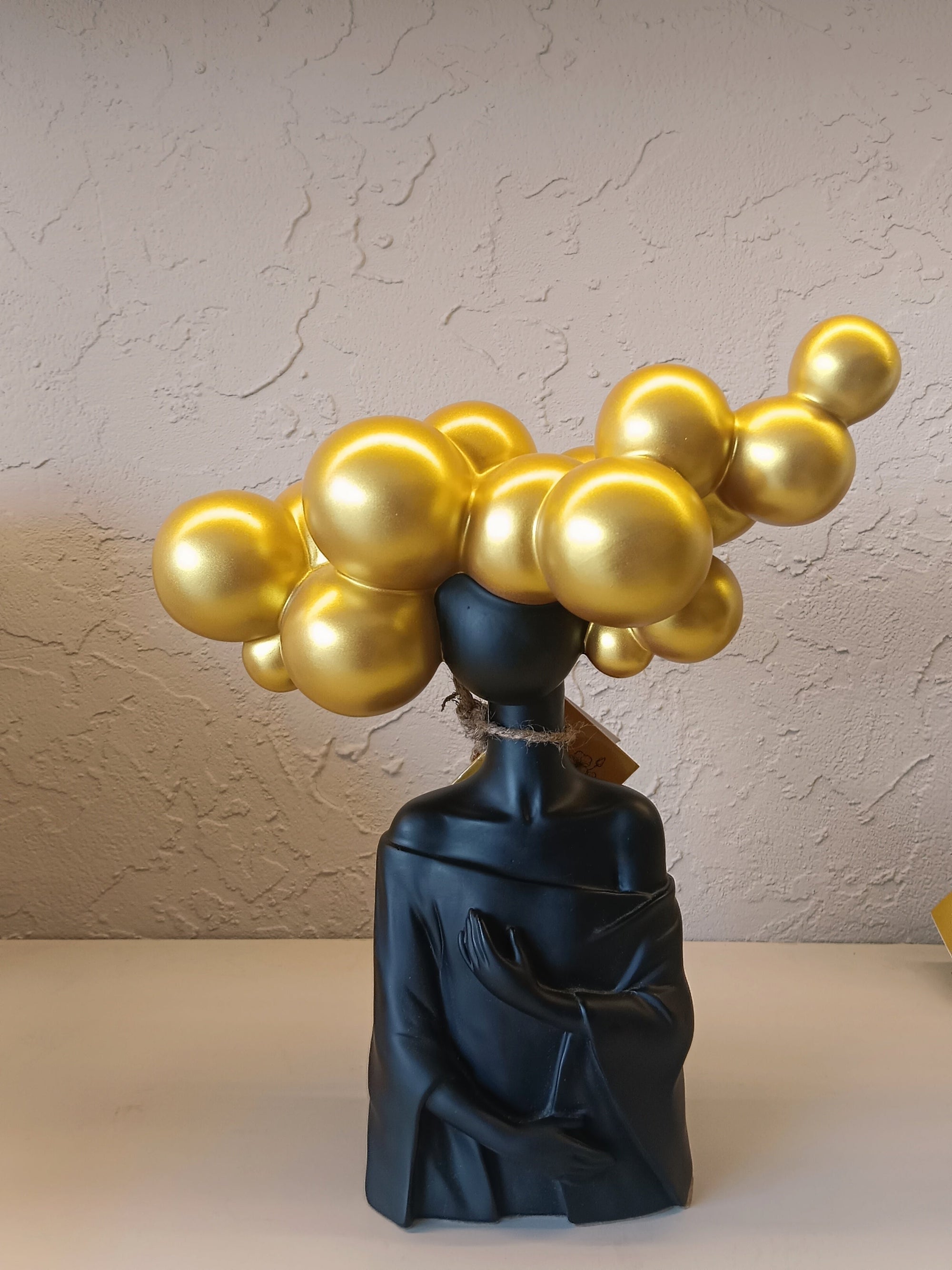 Modern Black Bust Sculputer With A Striking Headdress