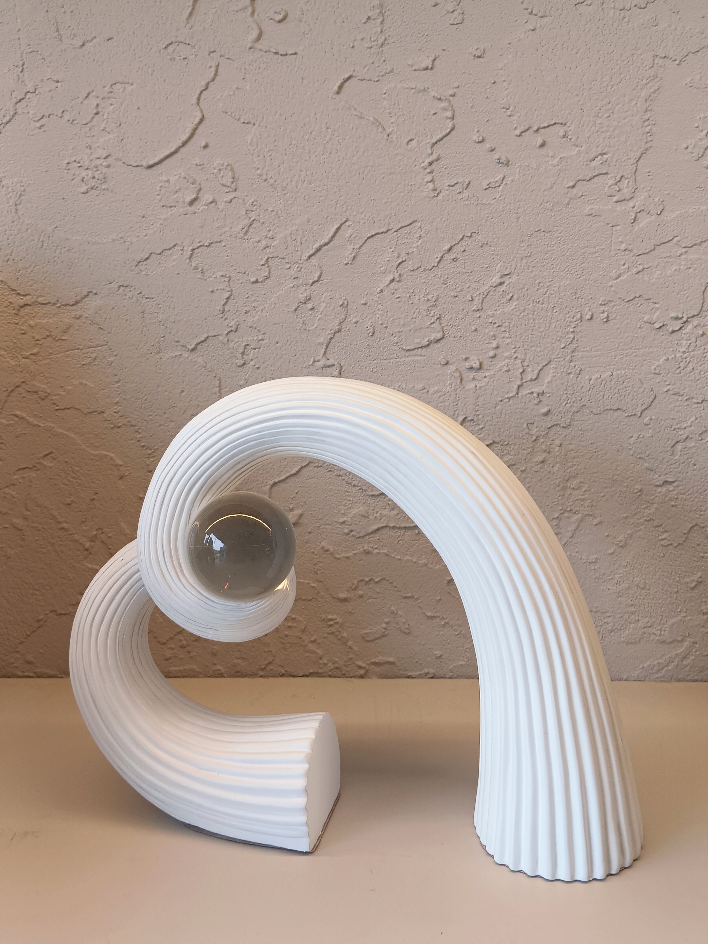 Sleek White Abstract Grace Fully Twisted In Spural Shape With Crystal Ball