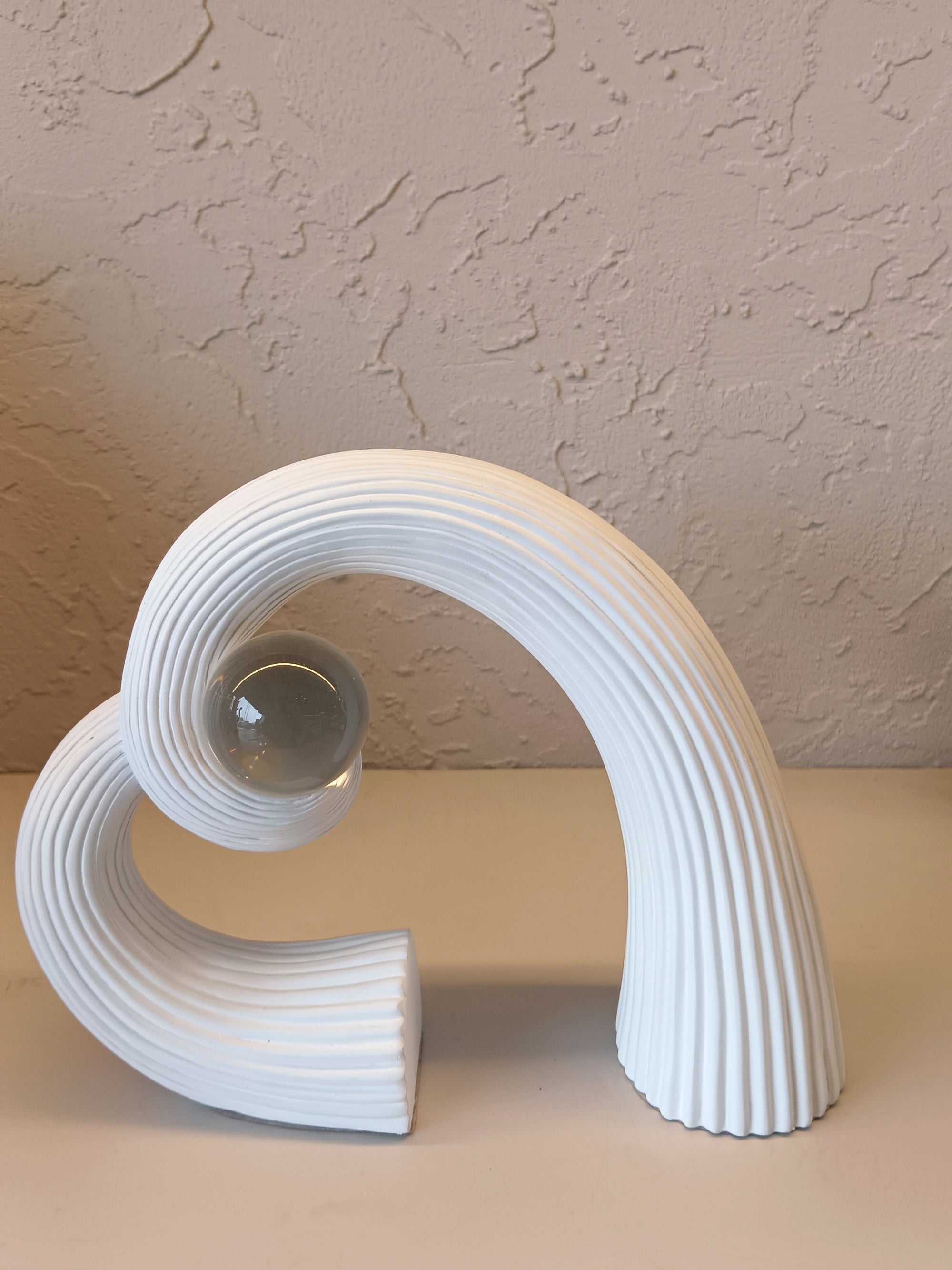 Sleek White Abstract Grace Fully Twisted In Spural Shape With Crystal Ball