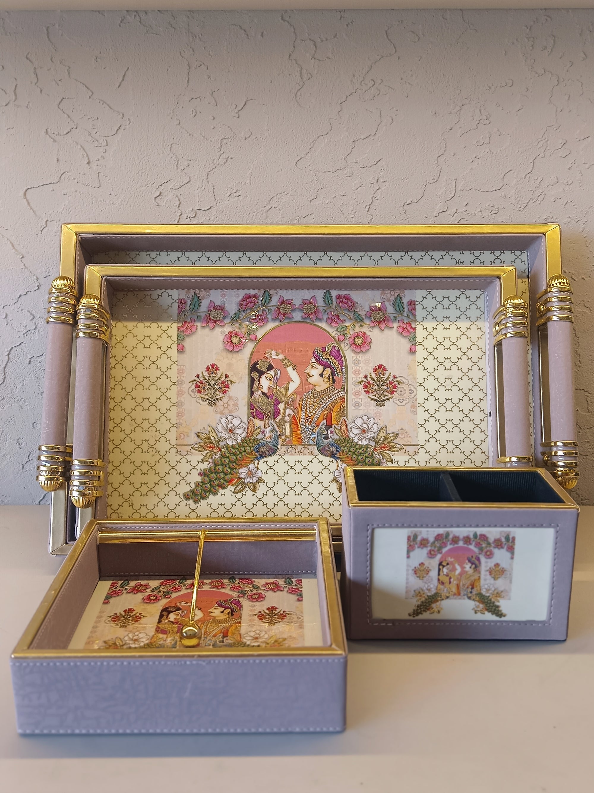 An Elegant Desk Accessory Set, Featuring A Tray, Box, And Tissue Holder, All Adorned With A Pastel Lavender Finish
