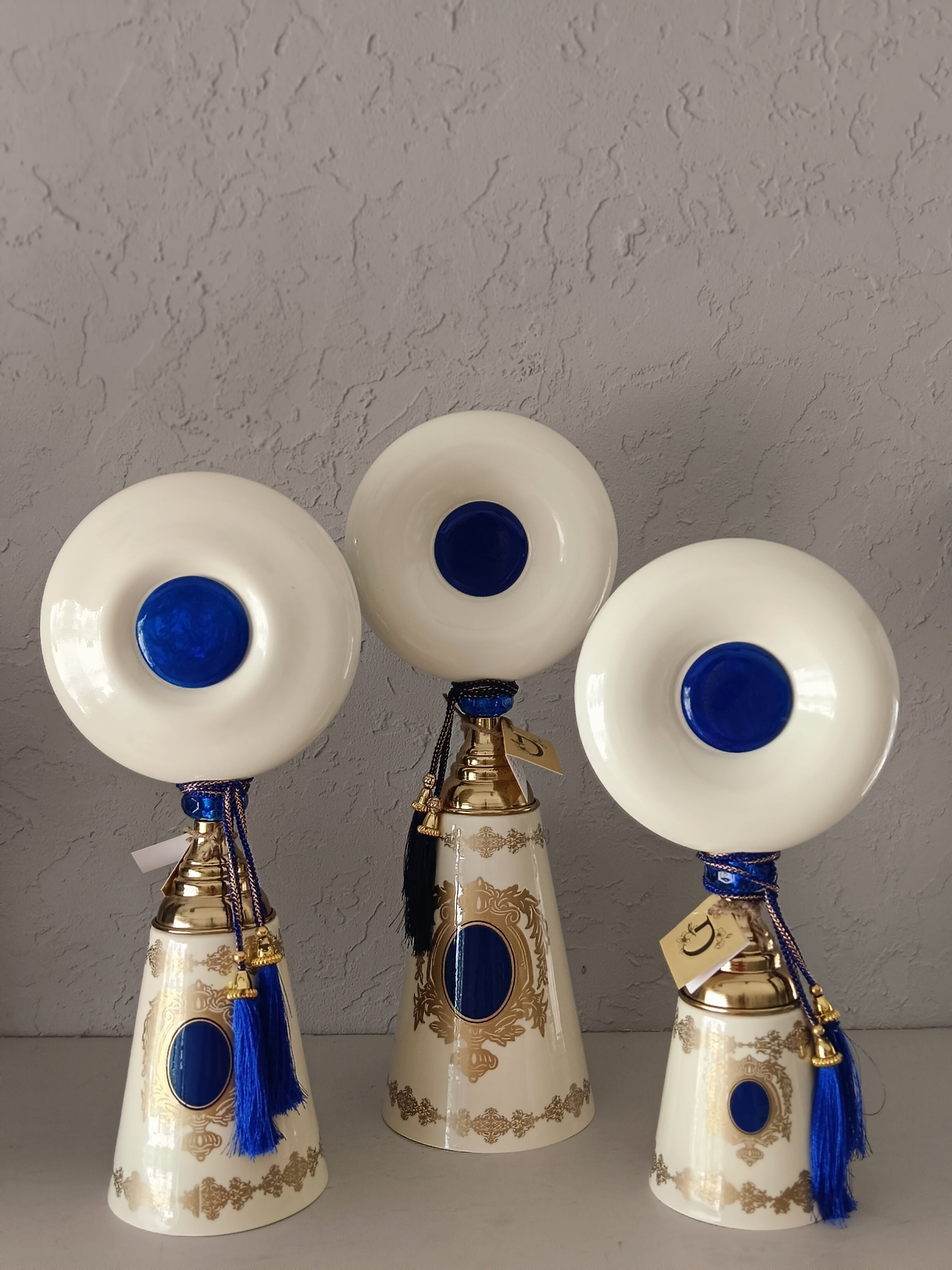 Turkish-Style Metal Decor Pieces,Featuring Conical Bases Adorned With Intricate Gold Detailing