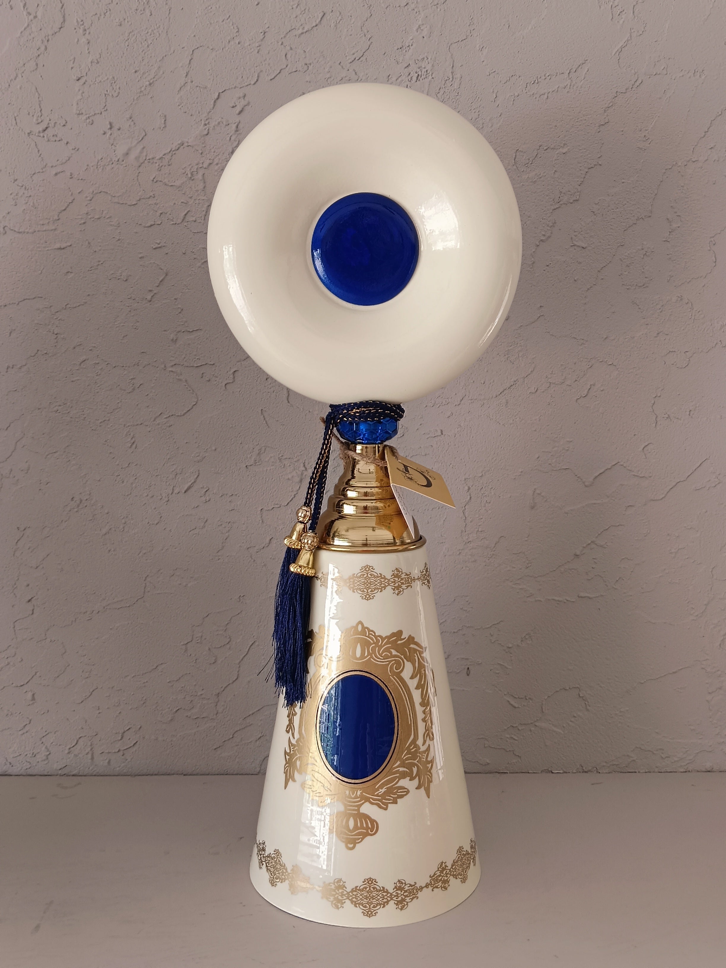 Turkish-Style Metal Decor Pieces,Featuring Conical Bases Adorned With Intricate Gold Detailing