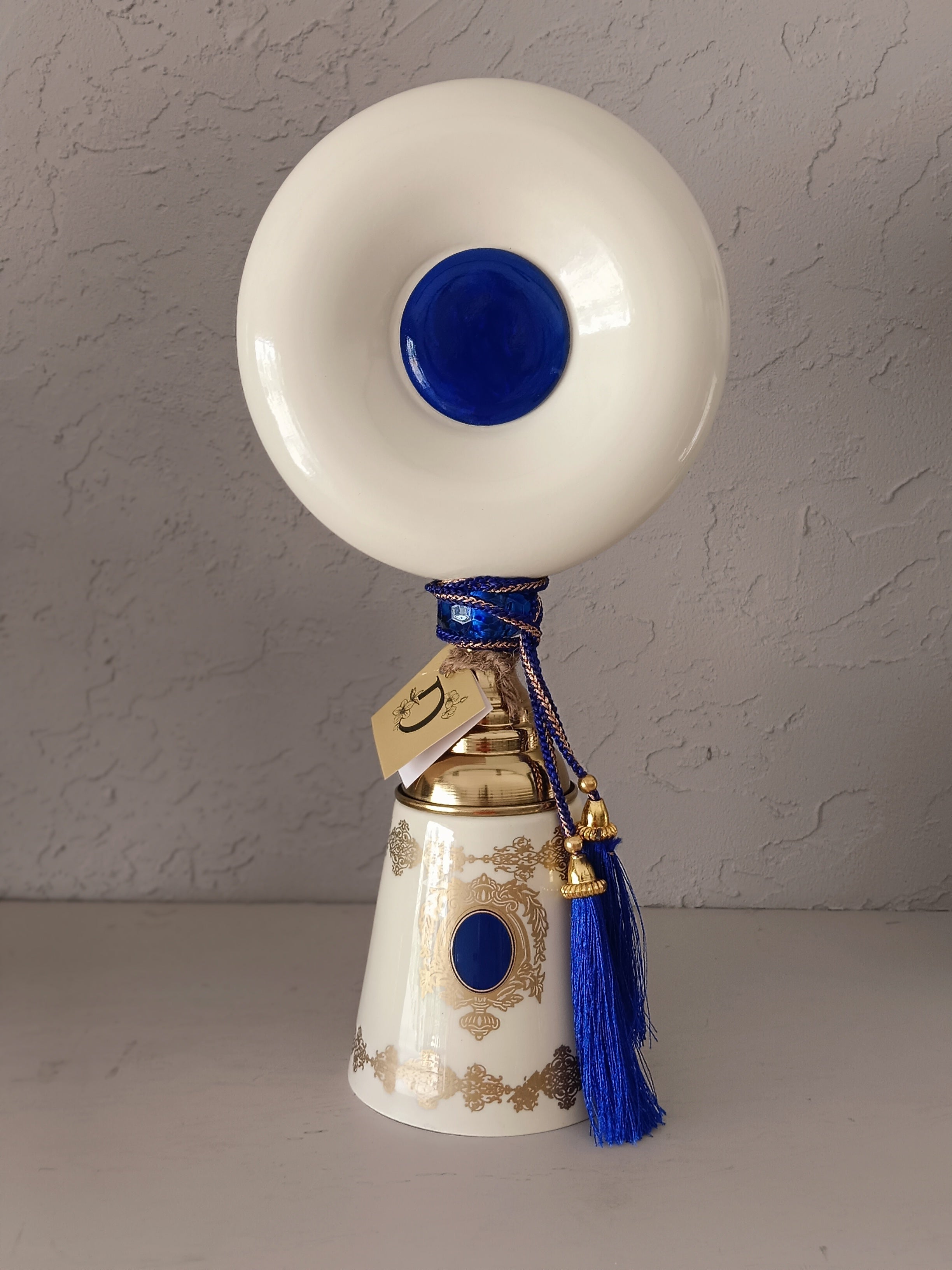 Turkish-Style Metal Decor Pieces,Featuring Conical Bases Adorned With Intricate Gold Detailing