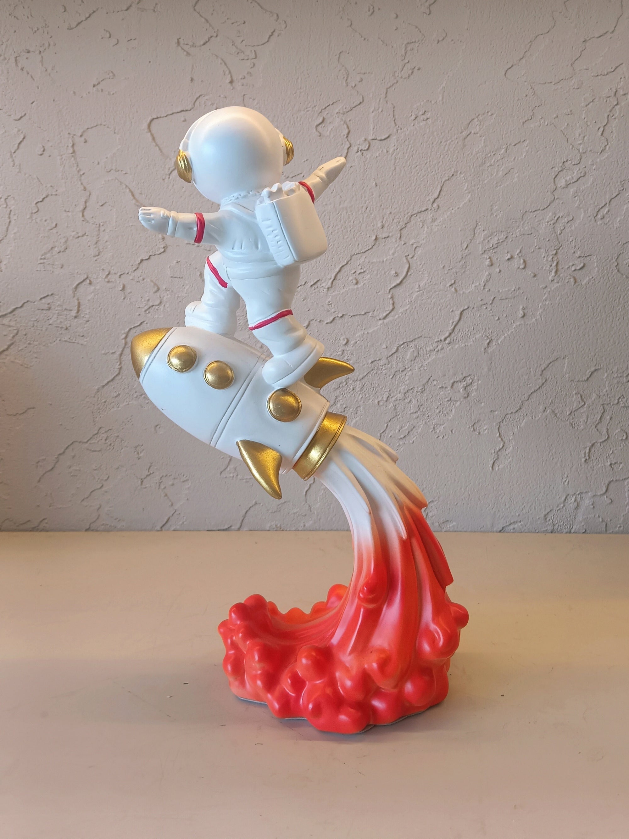 Astronaut Riding On Rocket