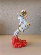 Astronaut Riding On Rocket