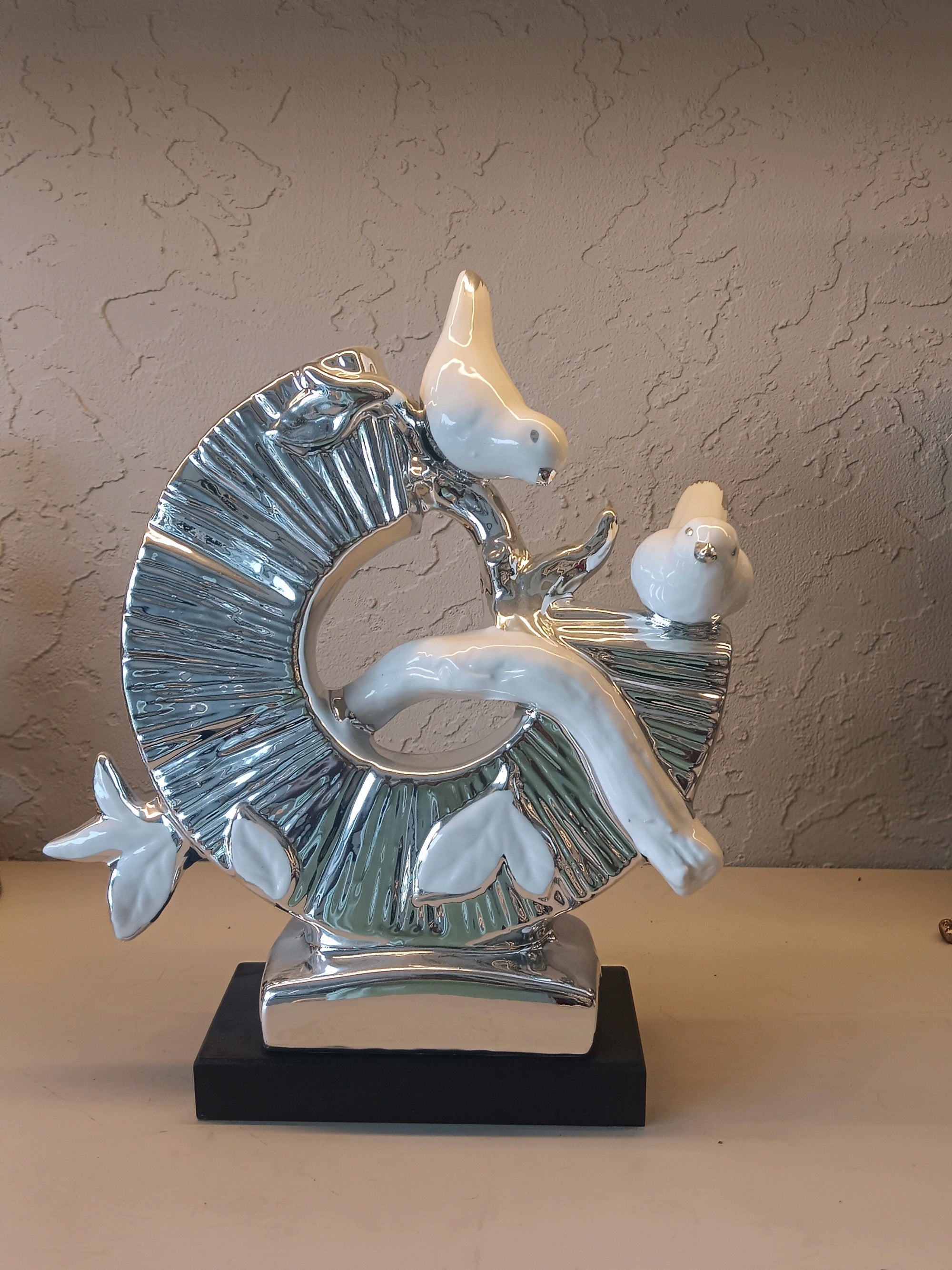 Stylish Ceramic 2 bird Sculpture on a Glossy Silver Ring