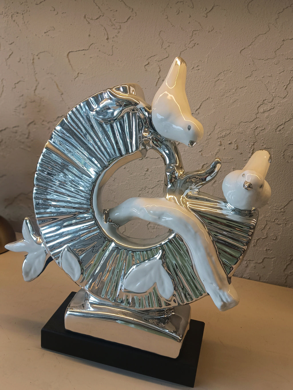 Stylish Ceramic 2 bird Sculpture on a Glossy Silver Ring