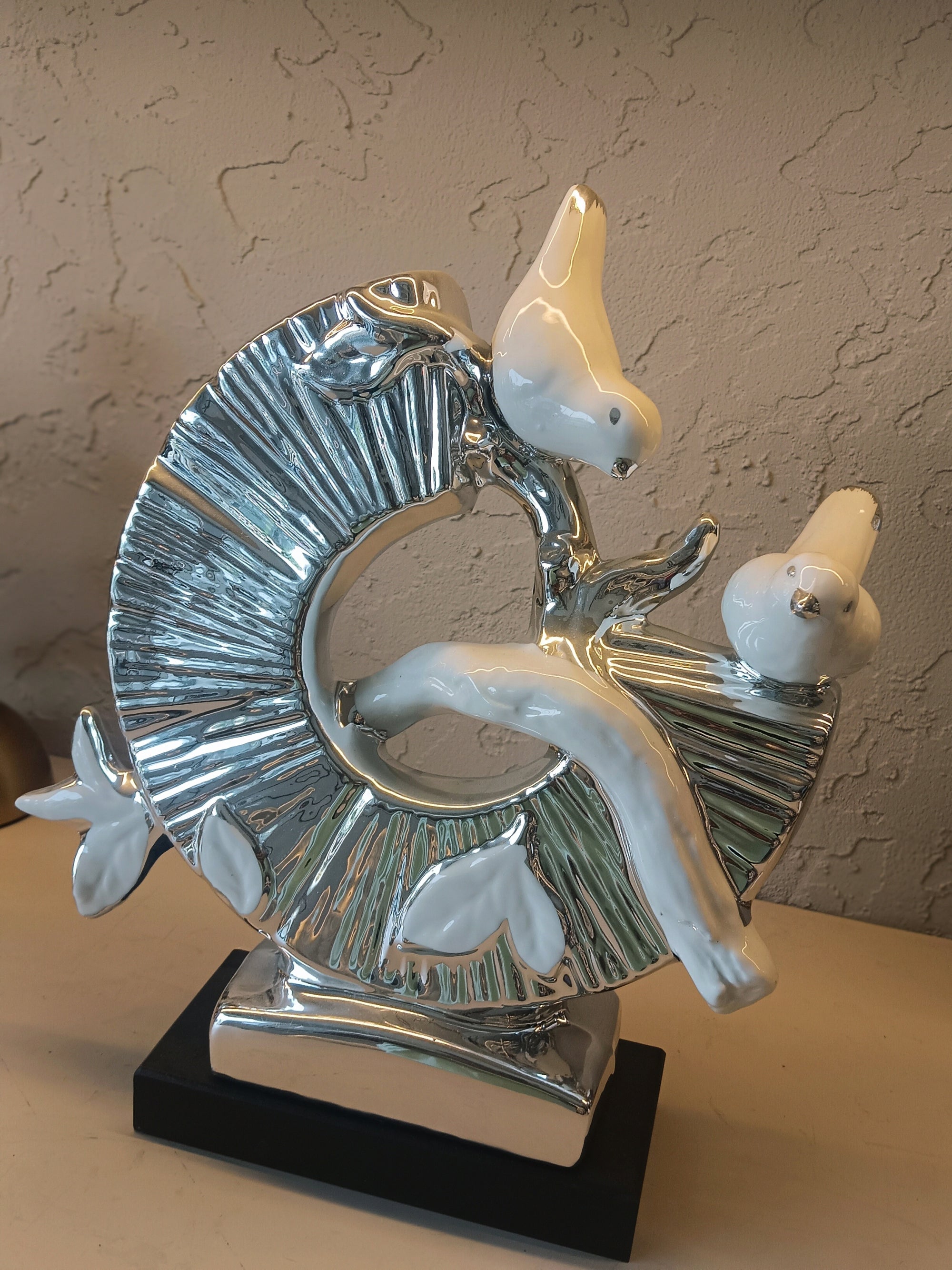 Stylish Ceramic 2 bird Sculpture on a Glossy Silver Ring