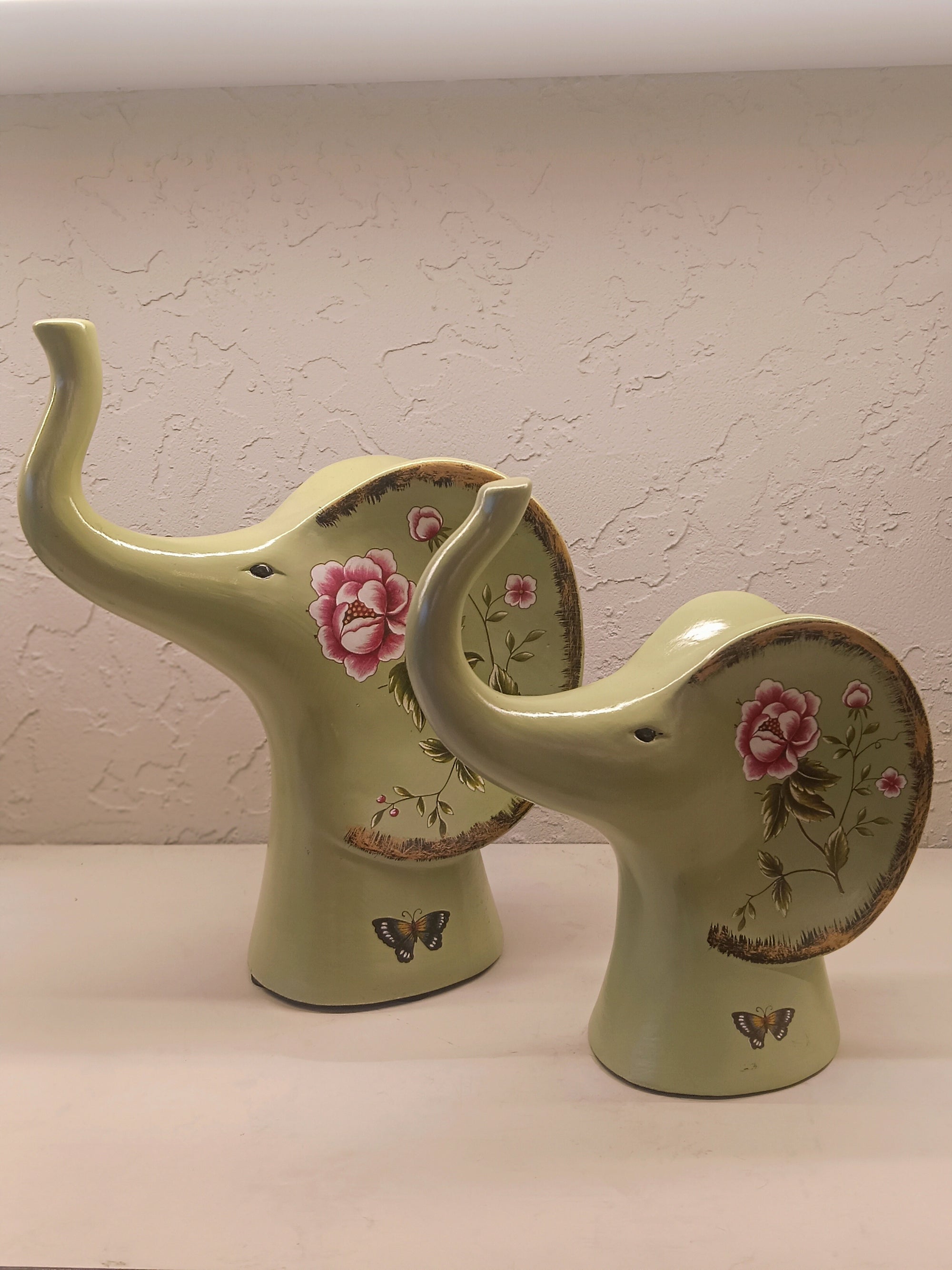 Elephant Figures Featuring A Soft Green Finish With Hand-Painted Floral Patterns Pair