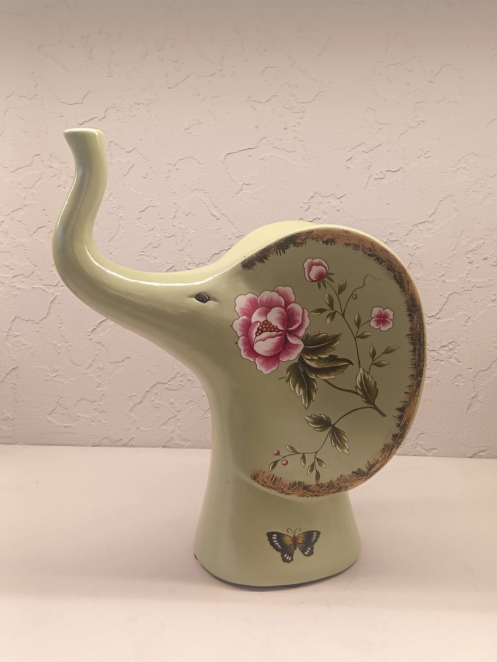 Elephant Figures Featuring A Soft Green Finish With Hand-Painted Floral Patterns Pair