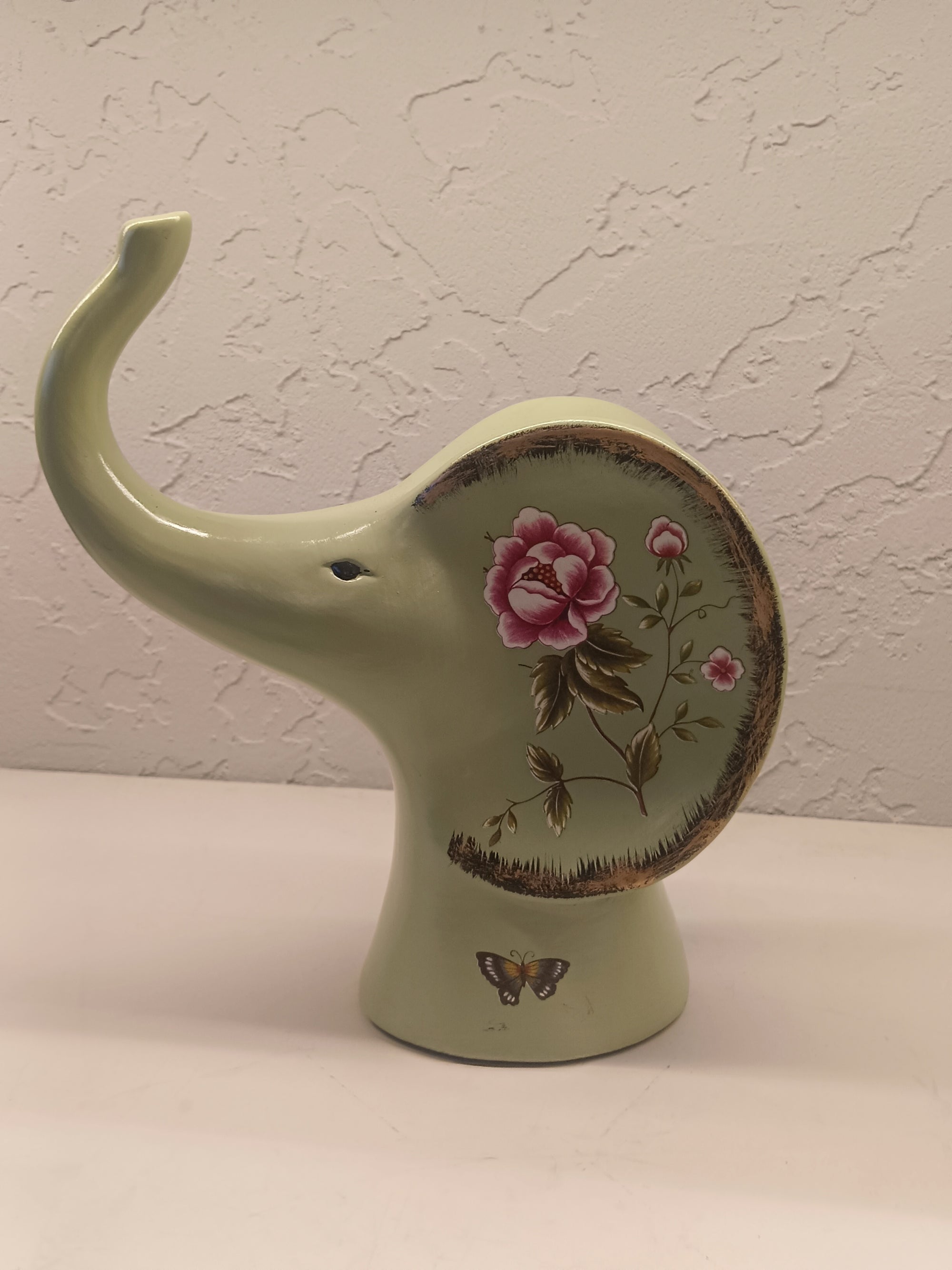 Elephant Figures Featuring A Soft Green Finish With Hand-Painted Floral Patterns Pair