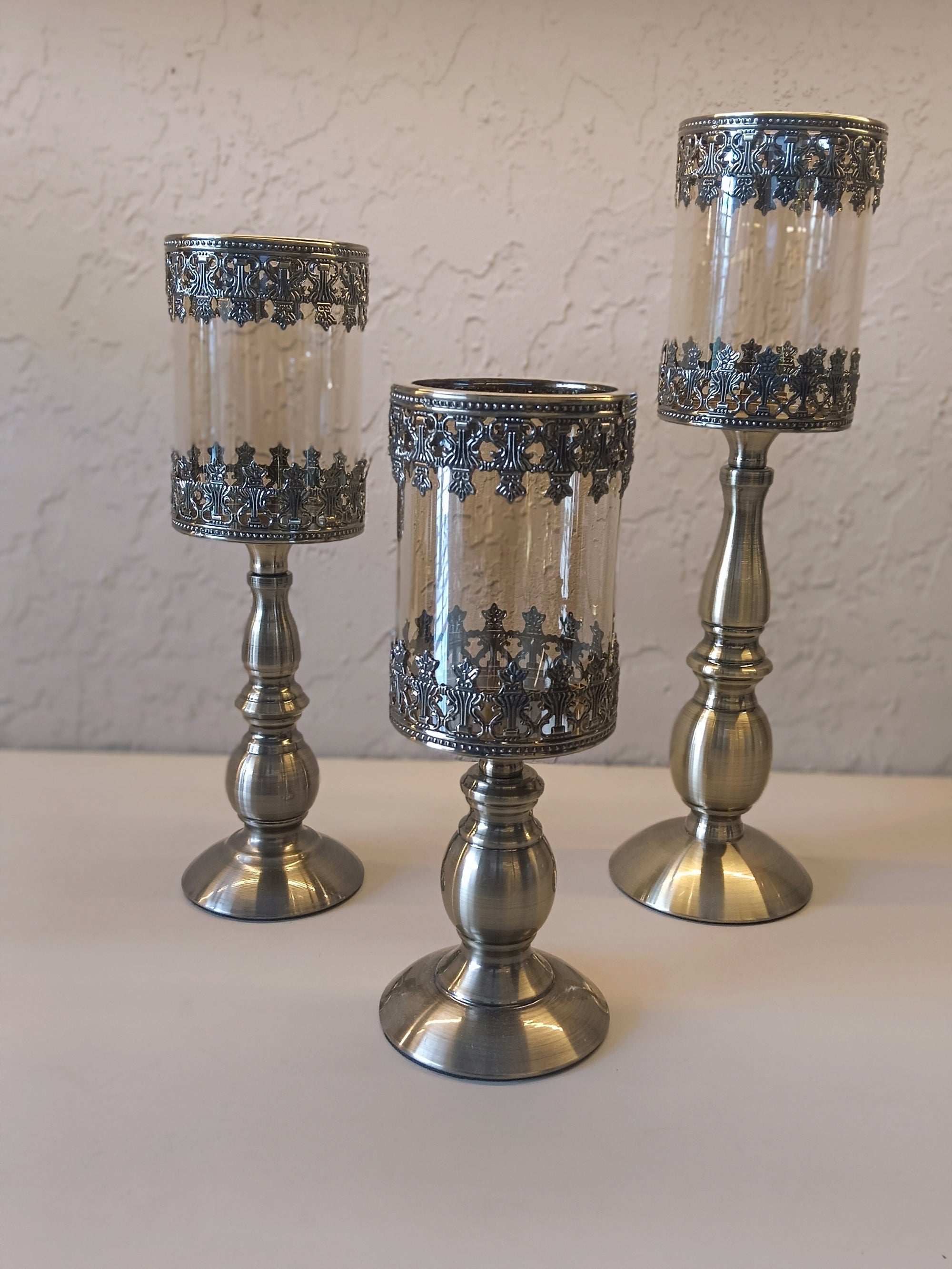 Candle Holders Crafted With Metallic Accents  And Glass