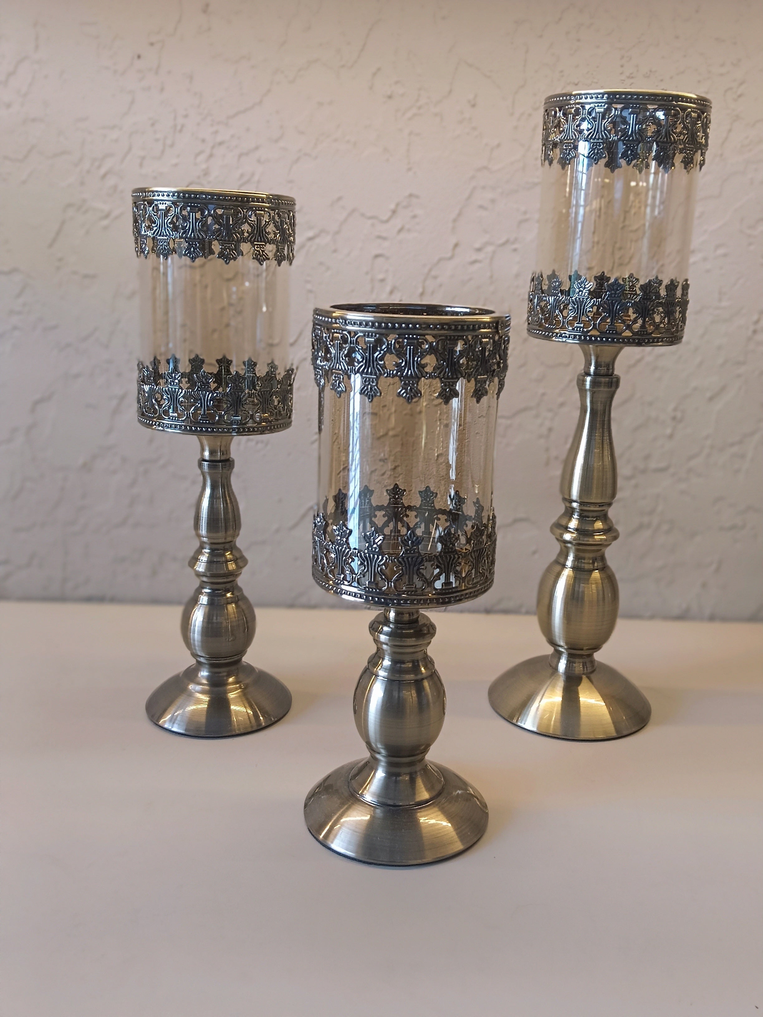 Candle Holders Crafted With Metallic Accents  And Glass