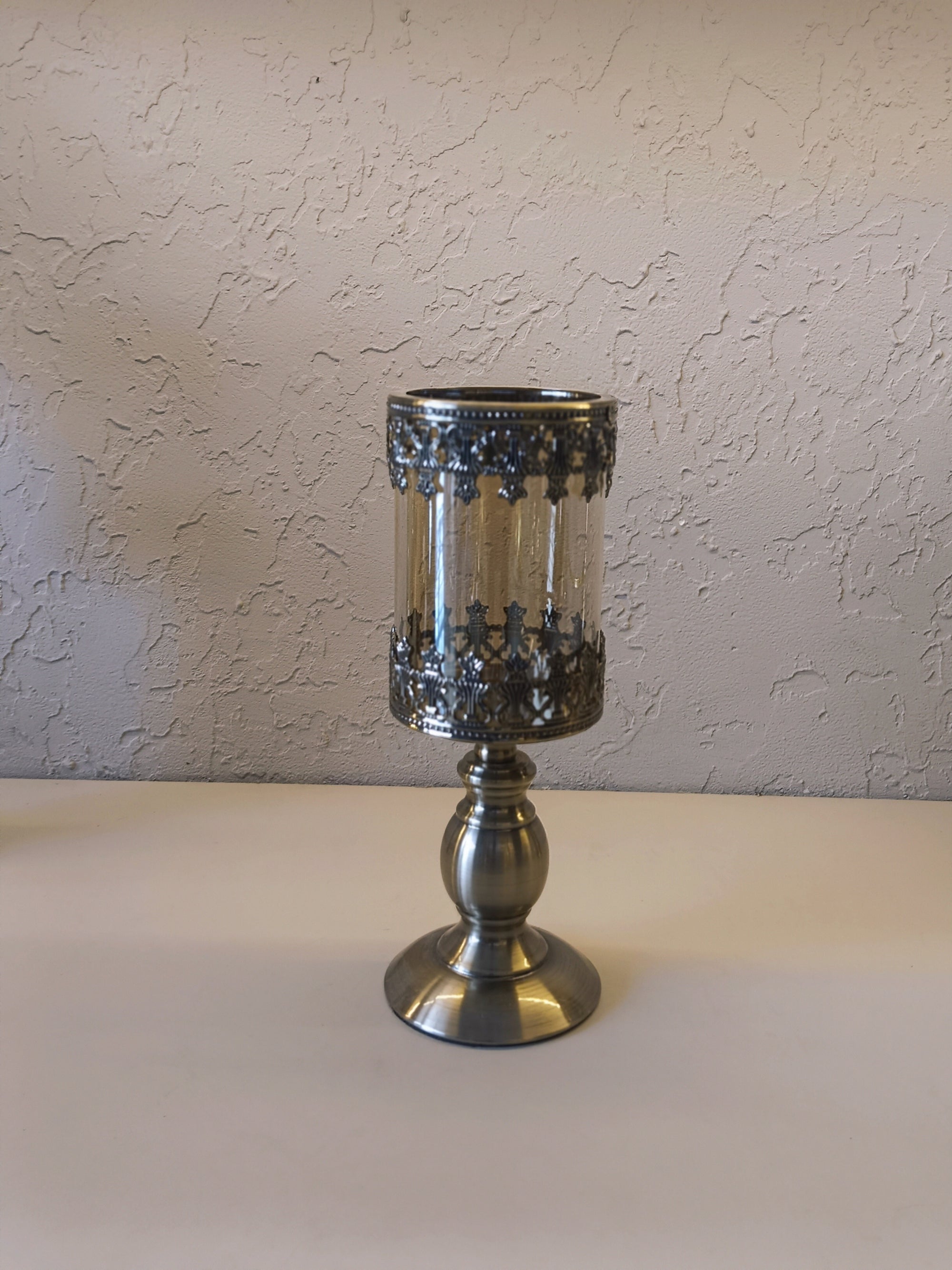 Candle Holders Crafted With Metallic Accents  And Glass