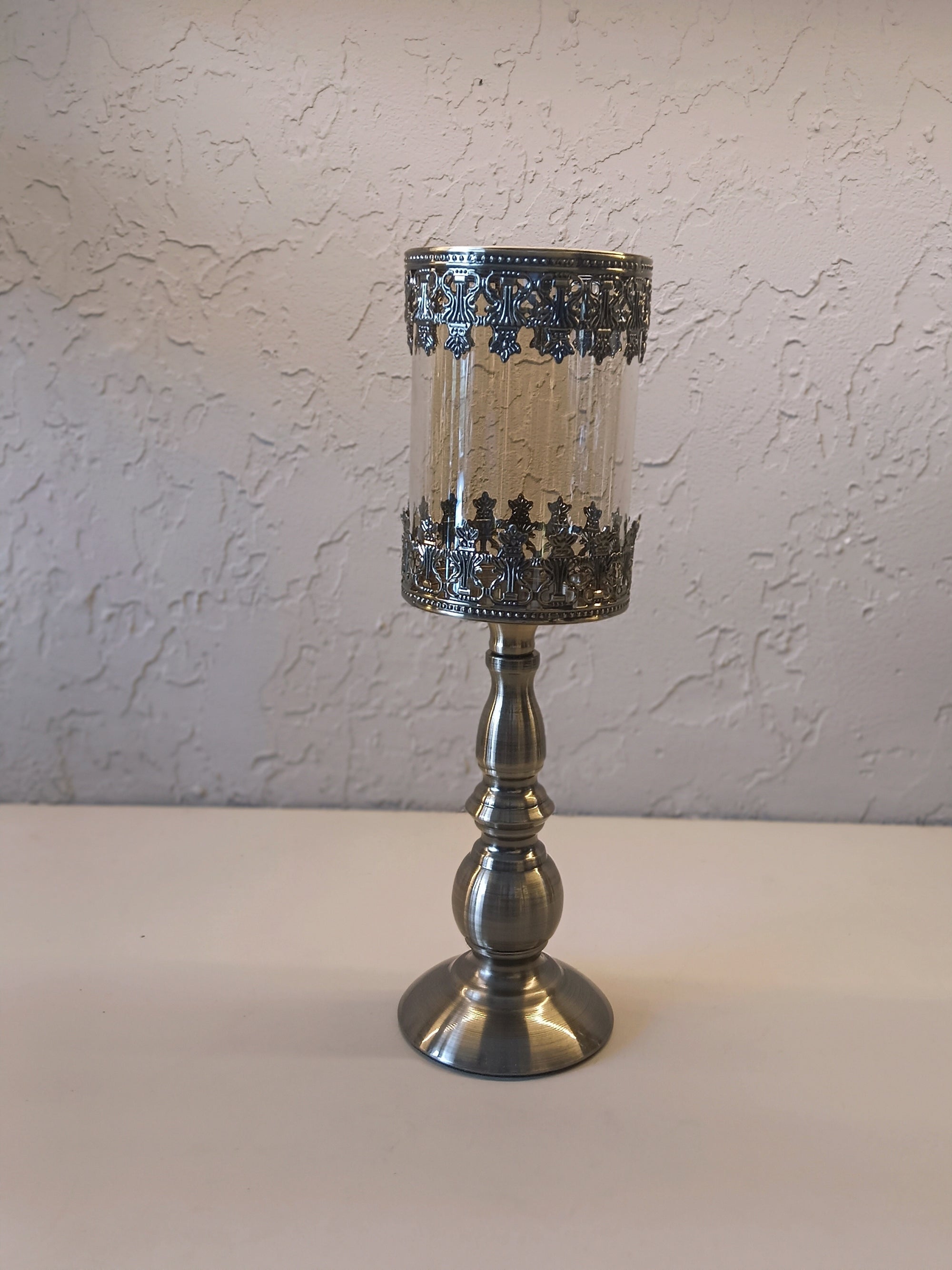 Candle Holders Crafted With Metallic Accents  And Glass