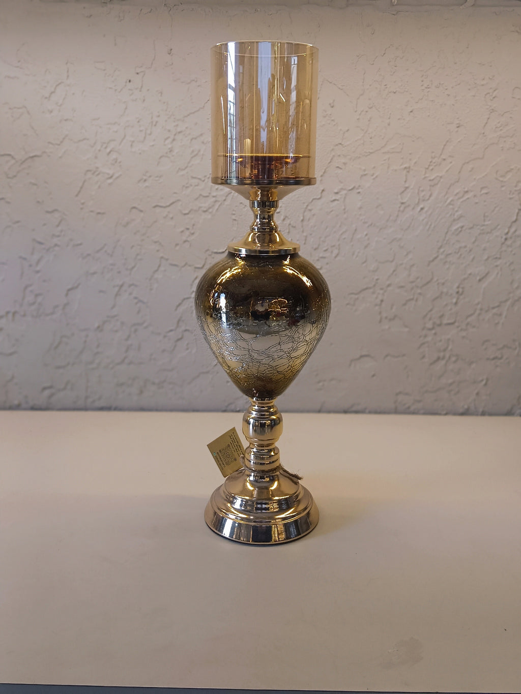 Candle Holders With A Reflective Silver Finish And Amber -Tinted Glass