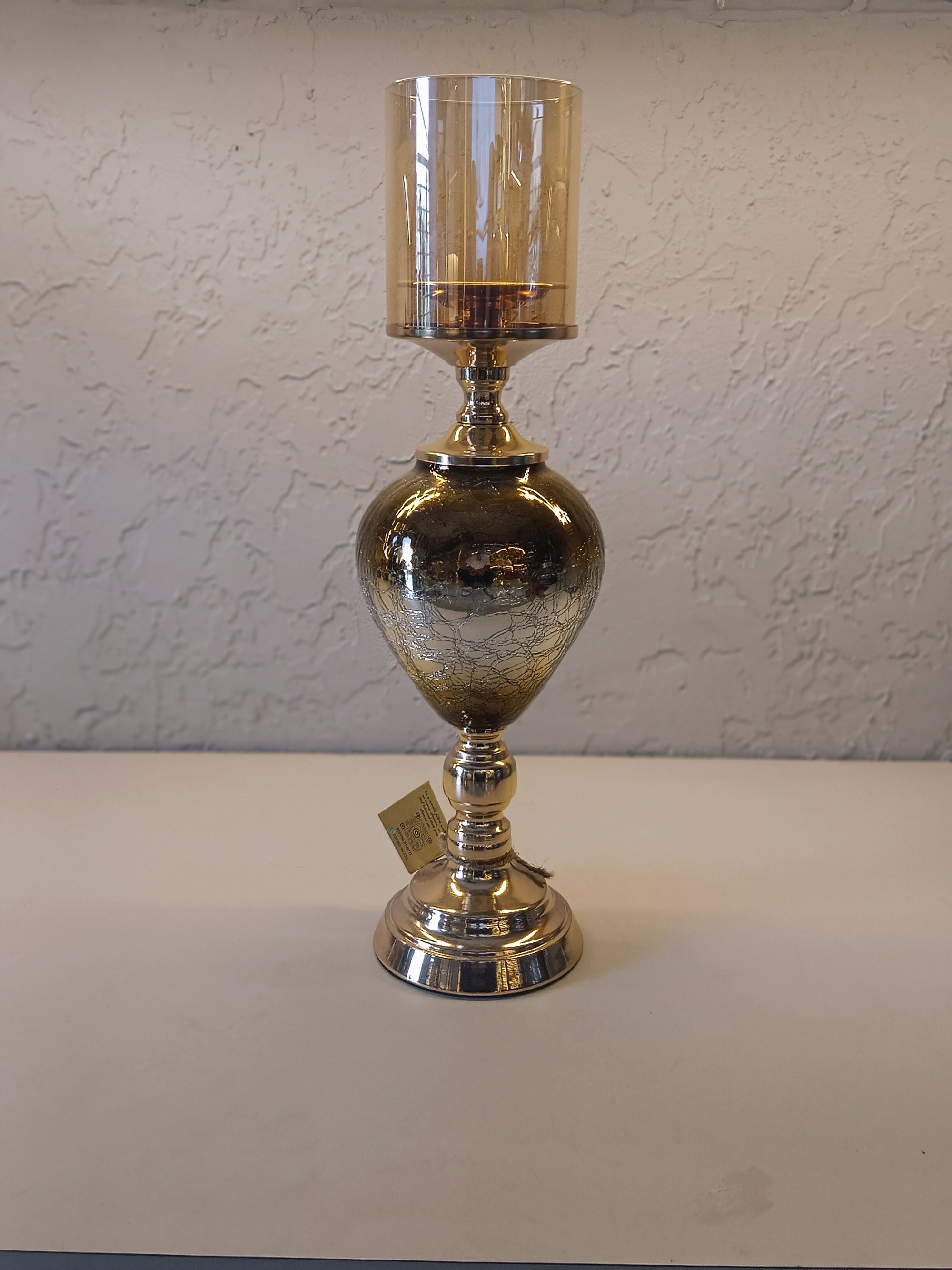 Candle Holders With A Reflective Silver Finish And Amber -Tinted Glass