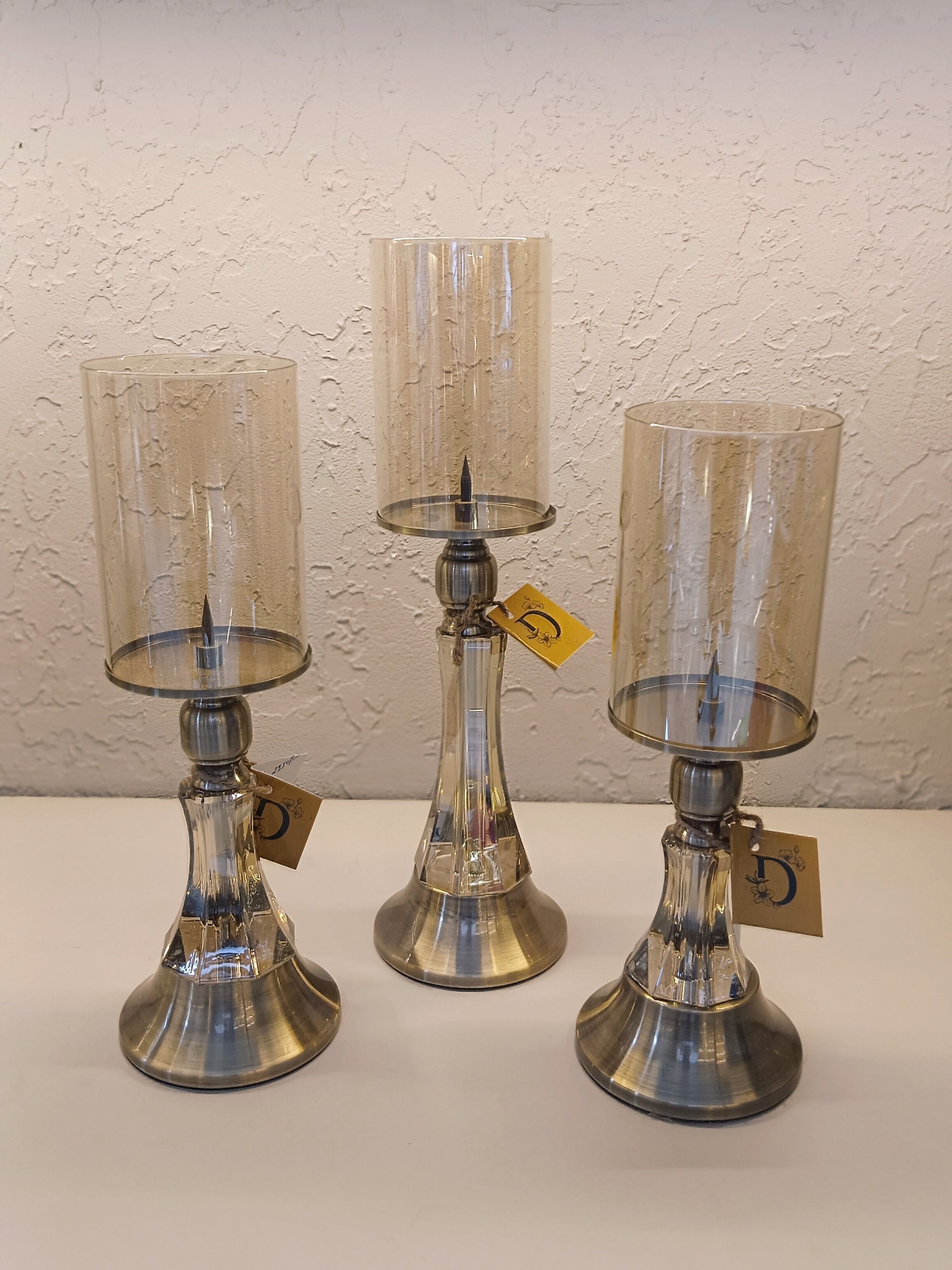 Candle Holders With Brushed Metallic Bases And Half Center With Acrylic