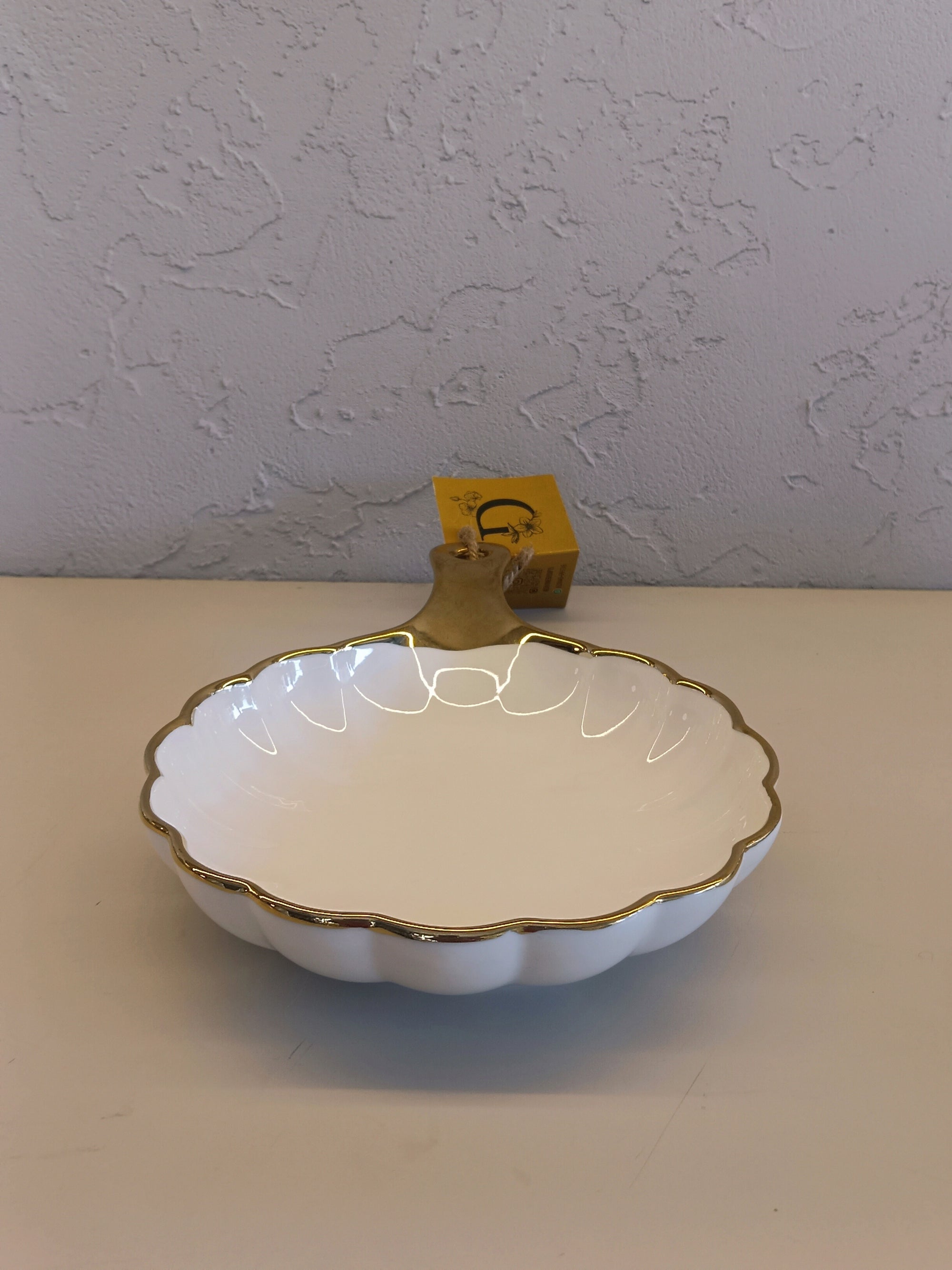 White Ceramic Serving Dish With A Scalloped Edge,