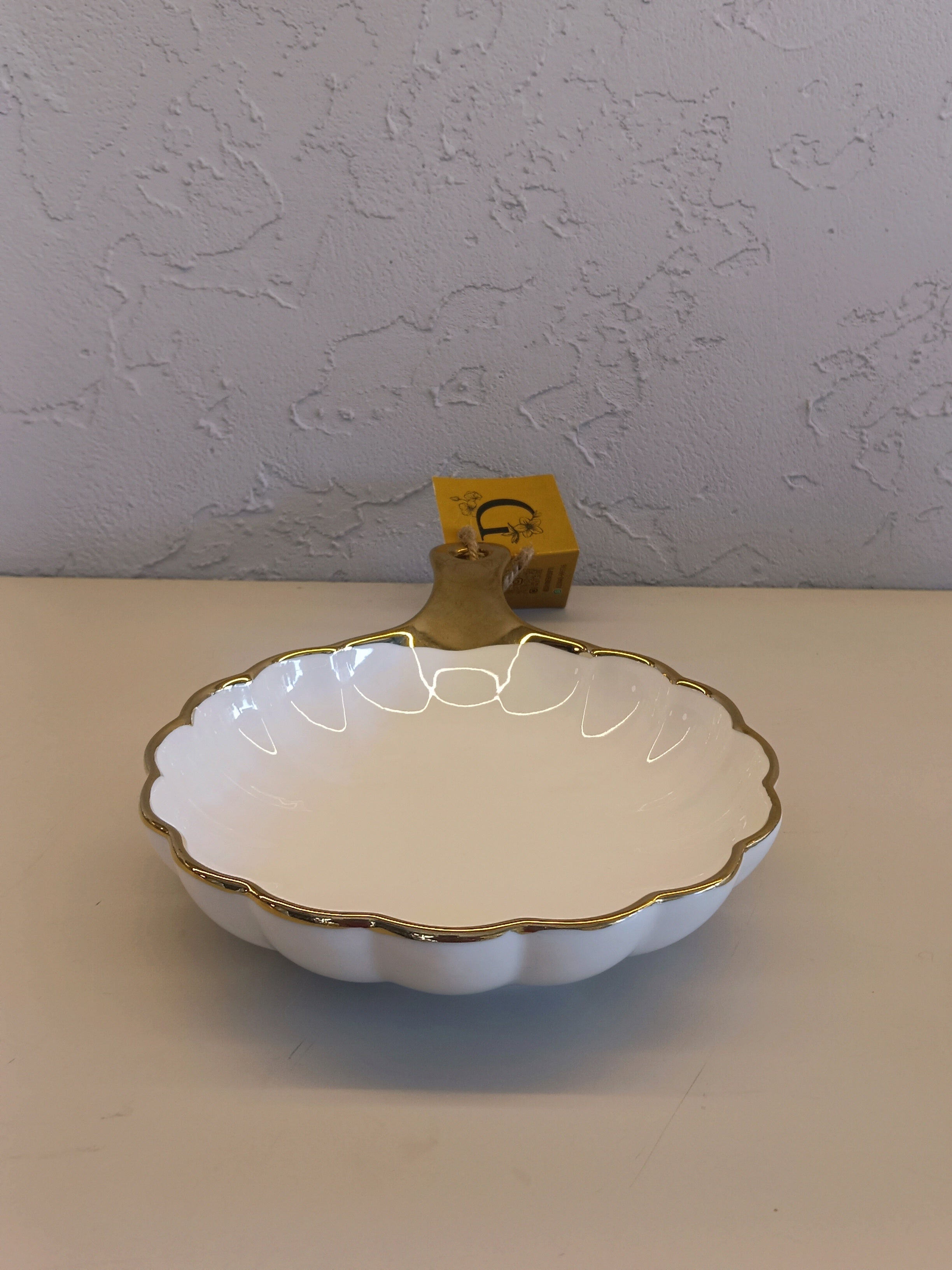 White Ceramic Serving Dish With A Scalloped Edge,