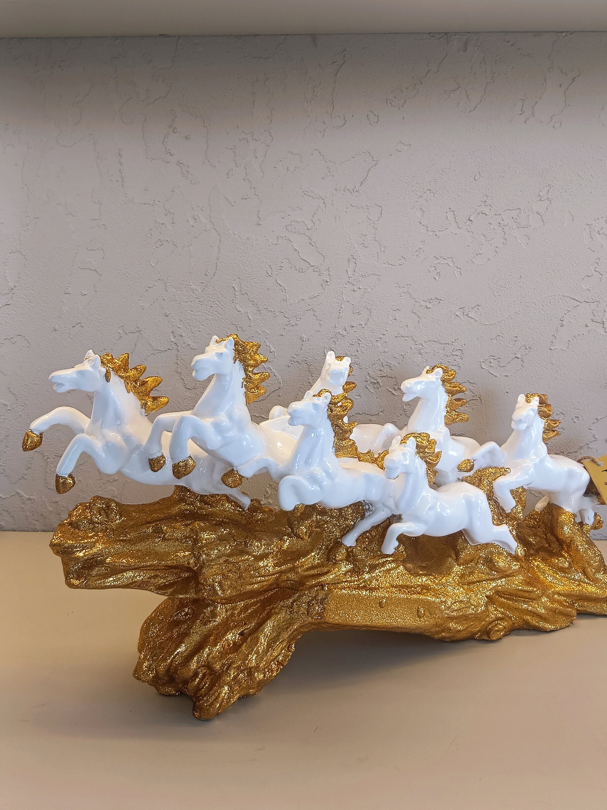 Stunning Decorative Showpiece Featuring Seven Galloping white Horses With Golden Detailing