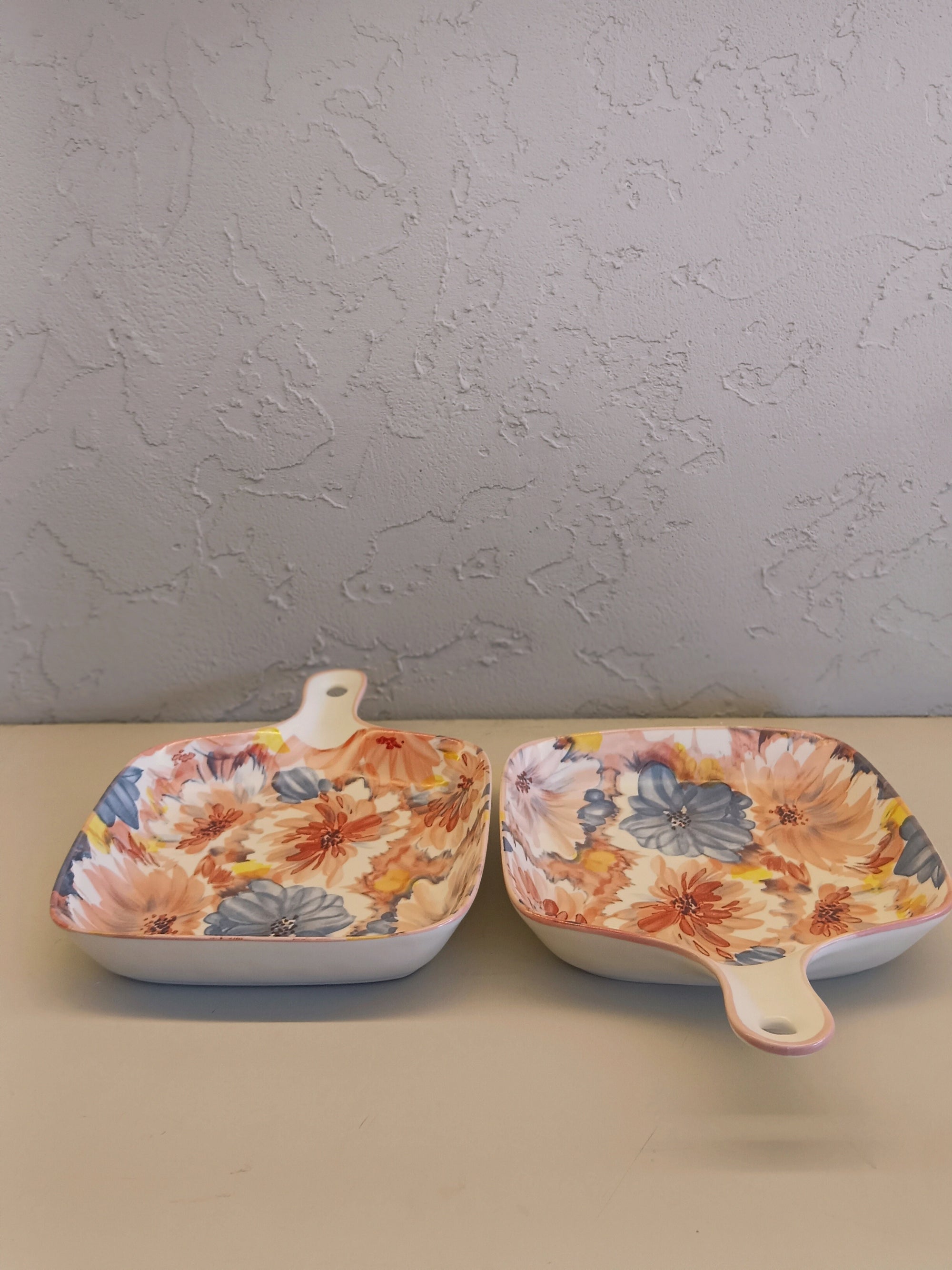 Set of two square ceramic serving dishes, each featuring a vibrant and Colorful Floral Pattern