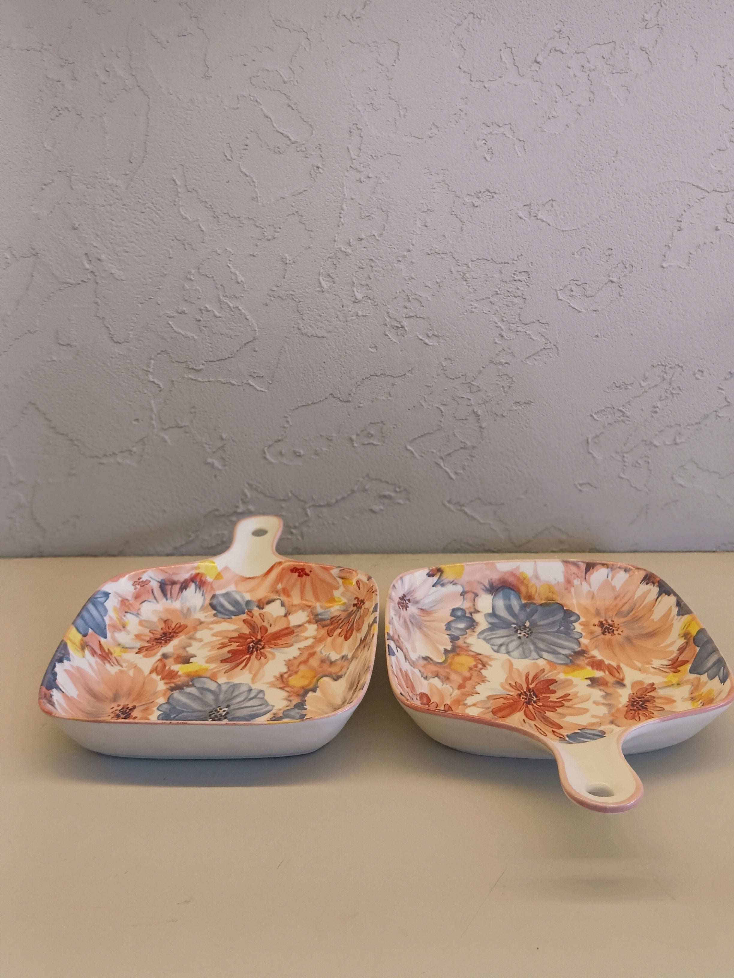 Set of two square ceramic serving dishes, each featuring a vibrant and Colorful Floral Pattern