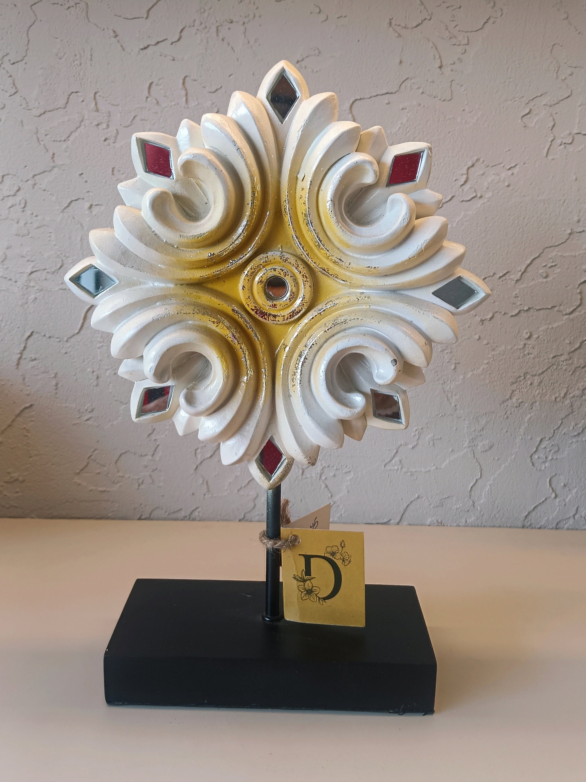 This Is A Decorative Tabletop Ornament Featuring An Ornate, Symmetrical Design With A Classic Vintage Appeal.