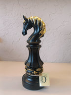 Three Elegantly Styled, Oversized Chess Pieces: A Queen, A Knight, And A King