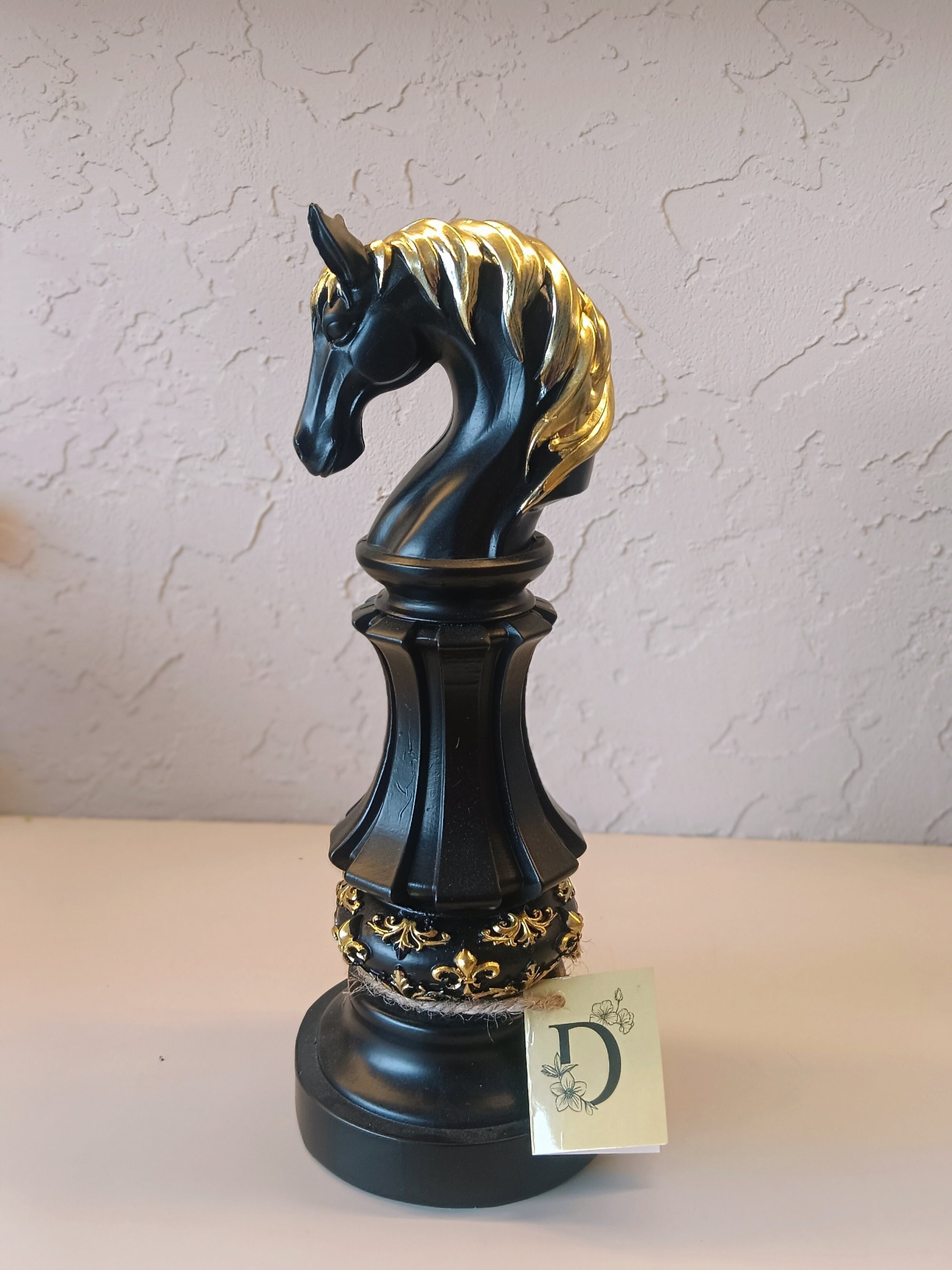 Three Elegantly Styled, Oversized Chess Pieces: A Queen, A Knight, And A King