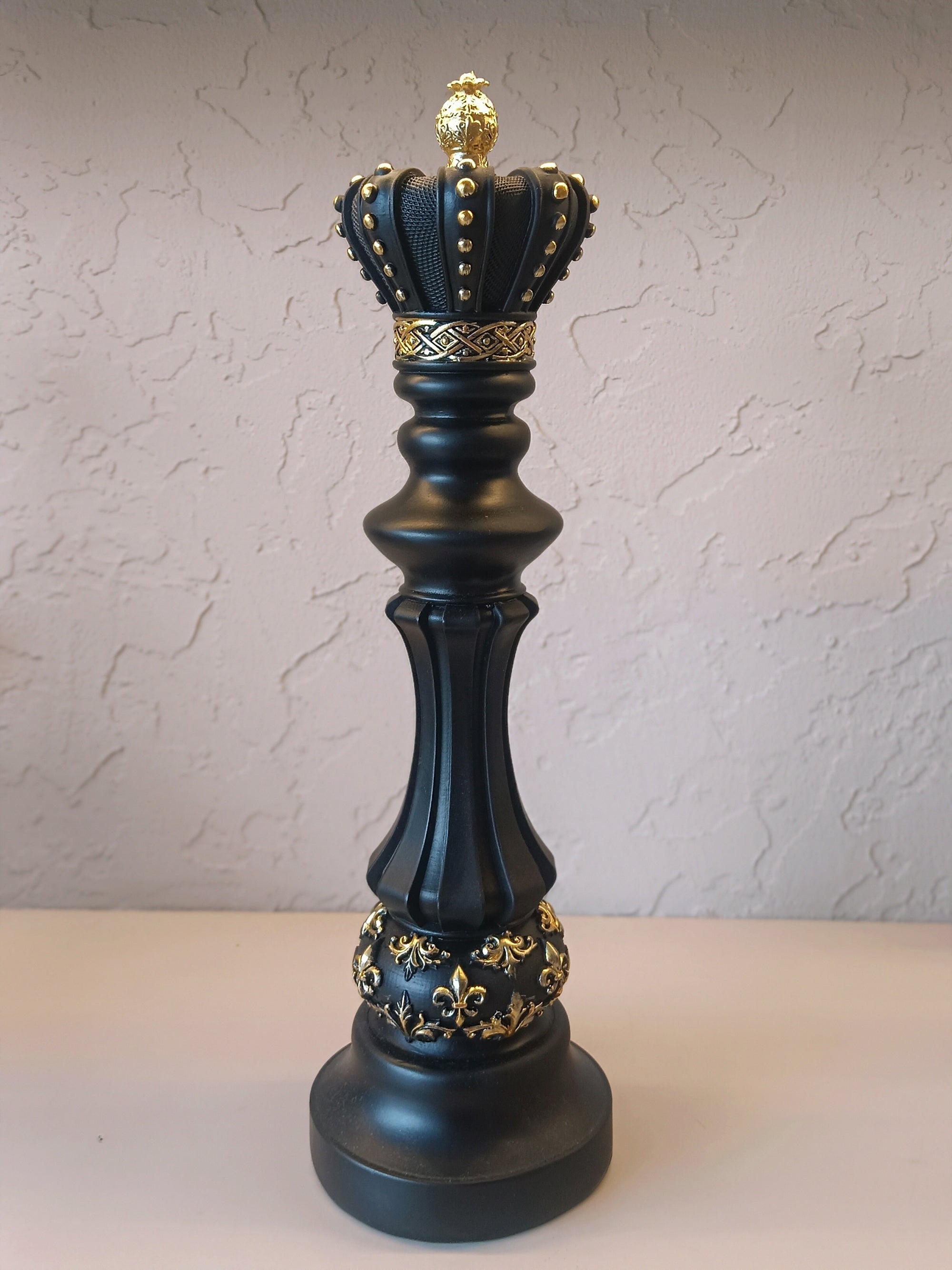 Three Elegantly Styled, Oversized Chess Pieces: A Queen, A Knight, And A King