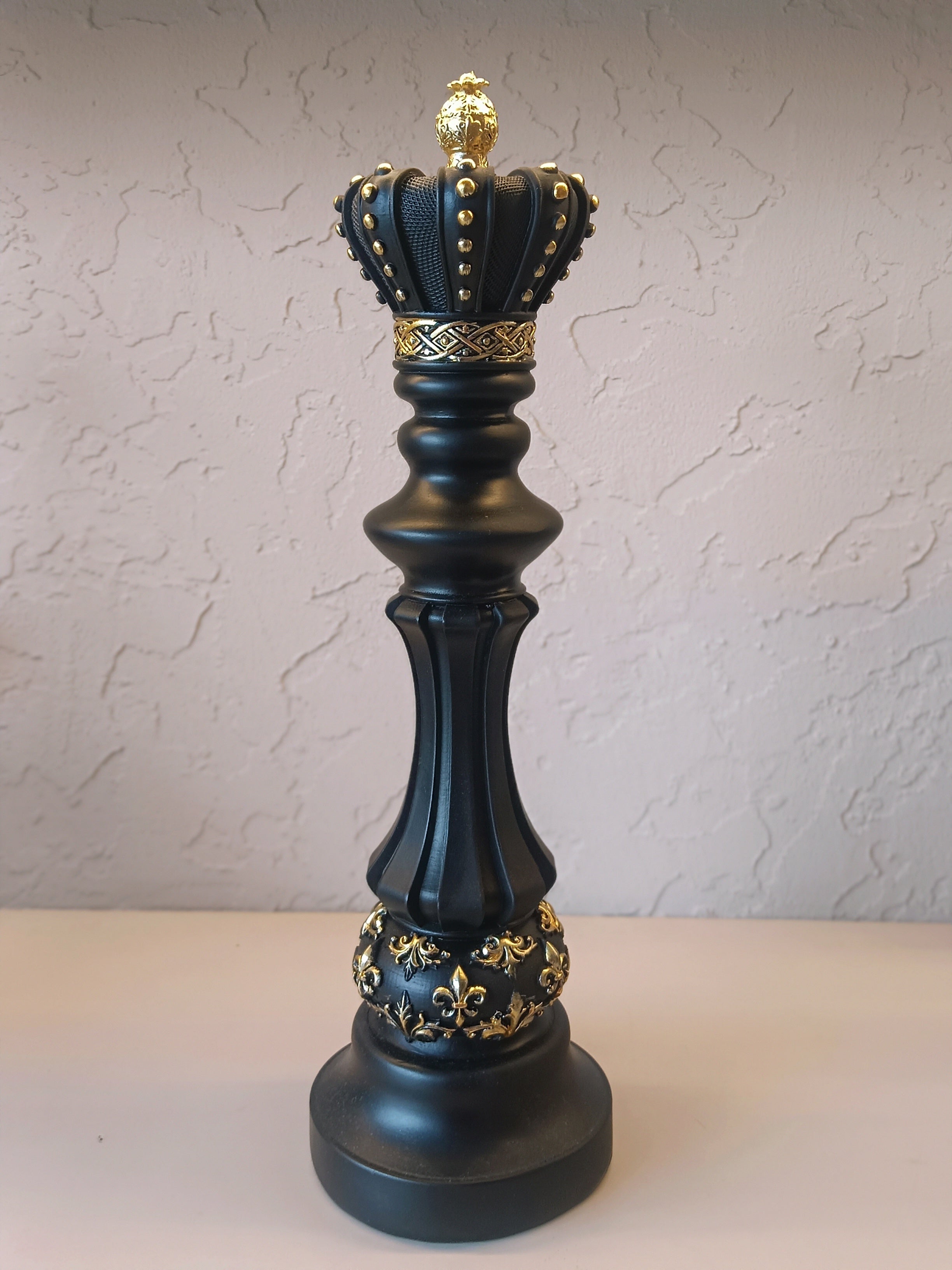 Three Elegantly Styled, Oversized Chess Pieces: A Queen, A Knight, And A King