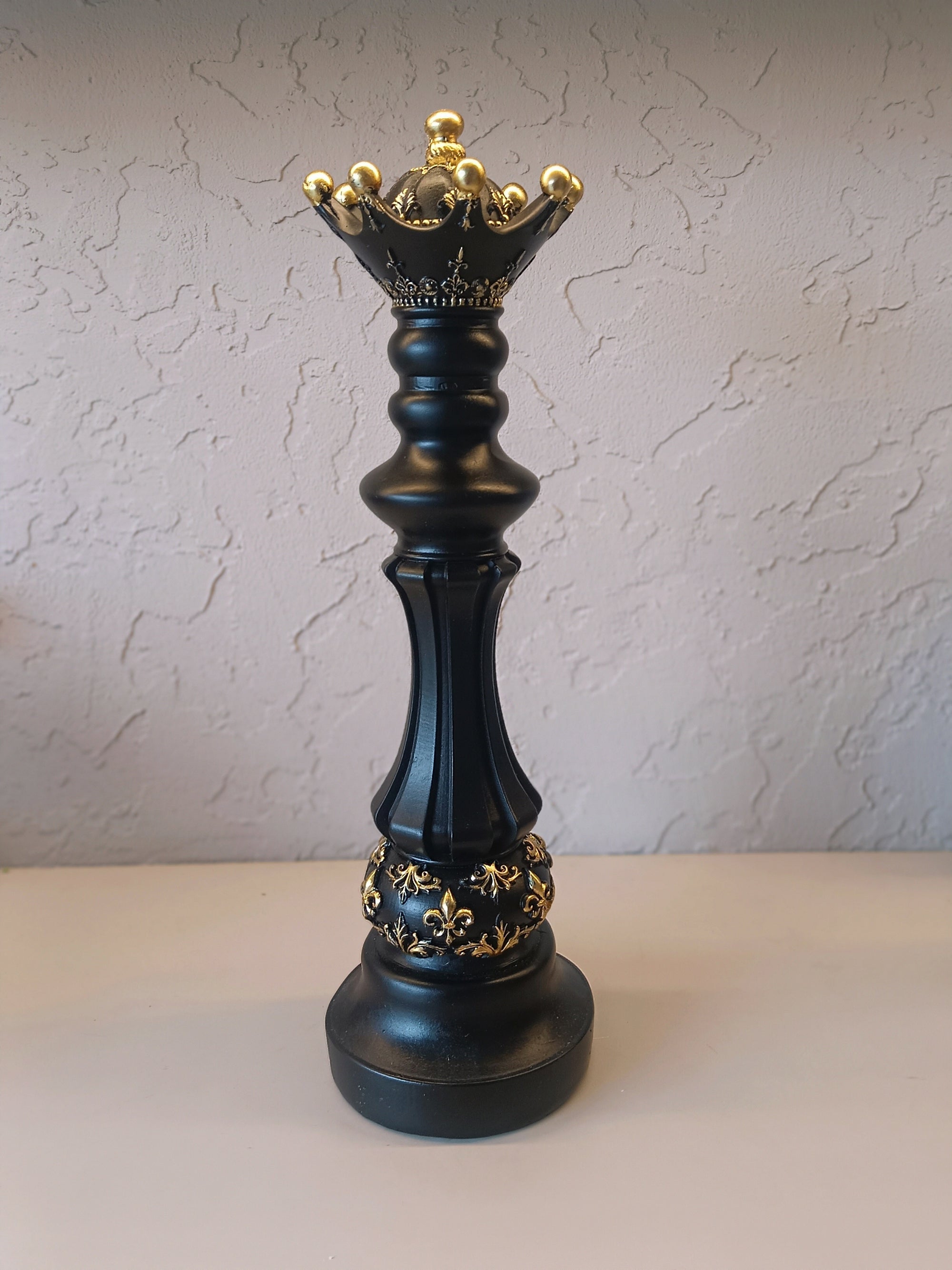 Three Elegantly Styled, Oversized Chess Pieces: A Queen, A Knight, And A King