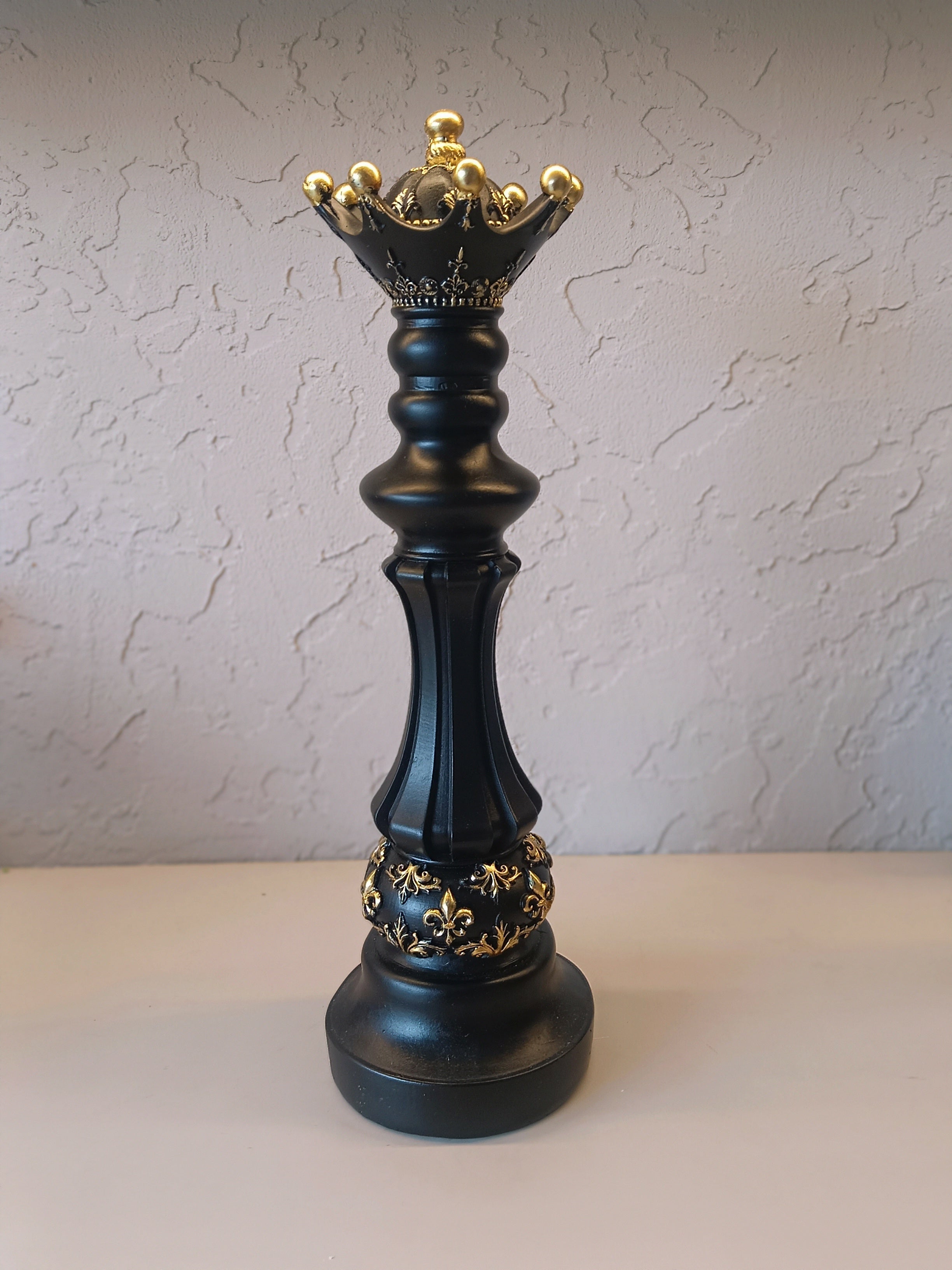 Three Elegantly Styled, Oversized Chess Pieces: A Queen, A Knight, And A King