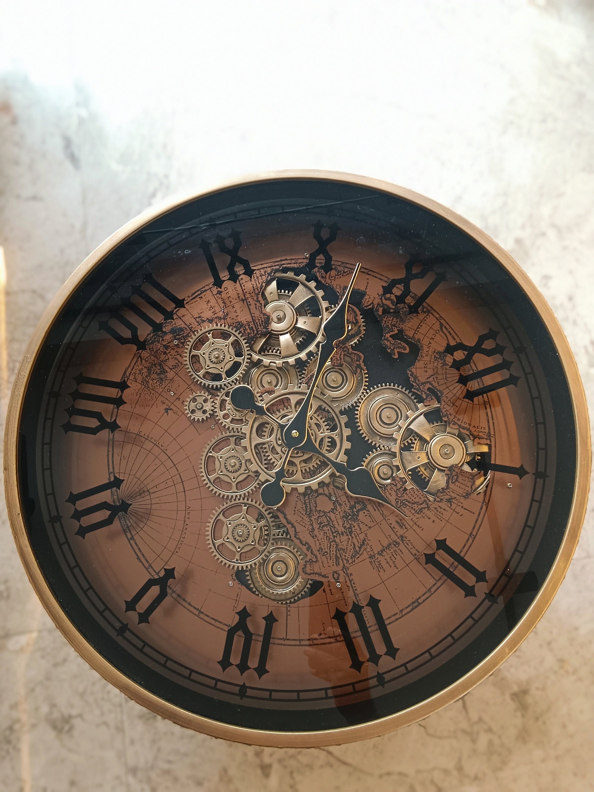 Designer Center Table With A Unique Clock-Themed Glass Top, Featuring Intricate Moving Gear Set On A Metallic Base