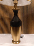 Stylish Modern Table Lamp With A Sleek Black And Gold Metallic Base