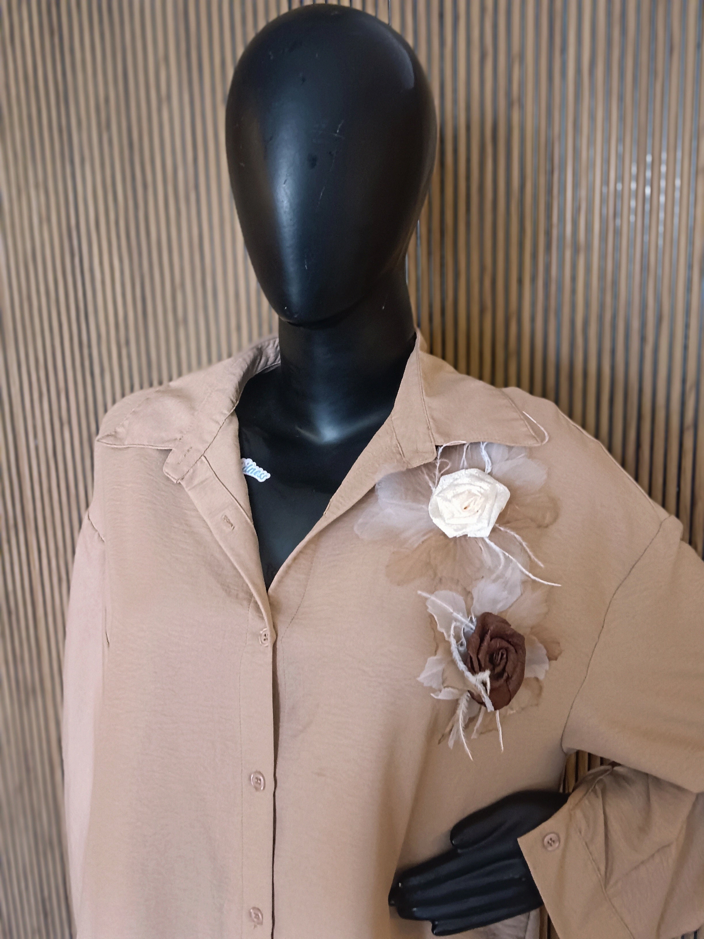 A Stylish Beige Co-ord Set Featuring A Relaxed-fit Shirt With A Collar And Button-Down Front