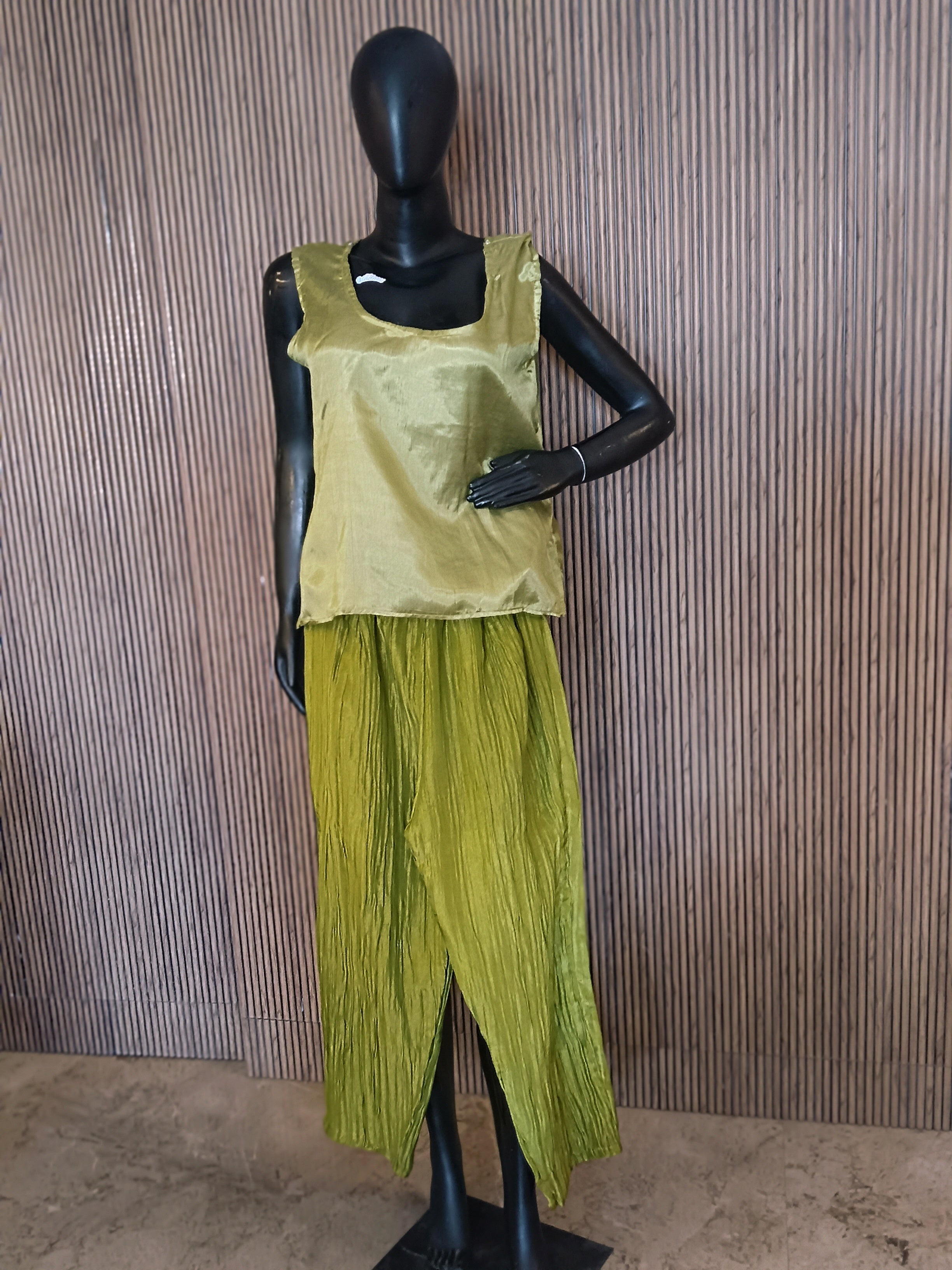 Olive Green Ethnic Kurti Made From Crinkle-Texture Fabric, Featuring Lavish Mirror And Sequin Embroidery On The Yoke