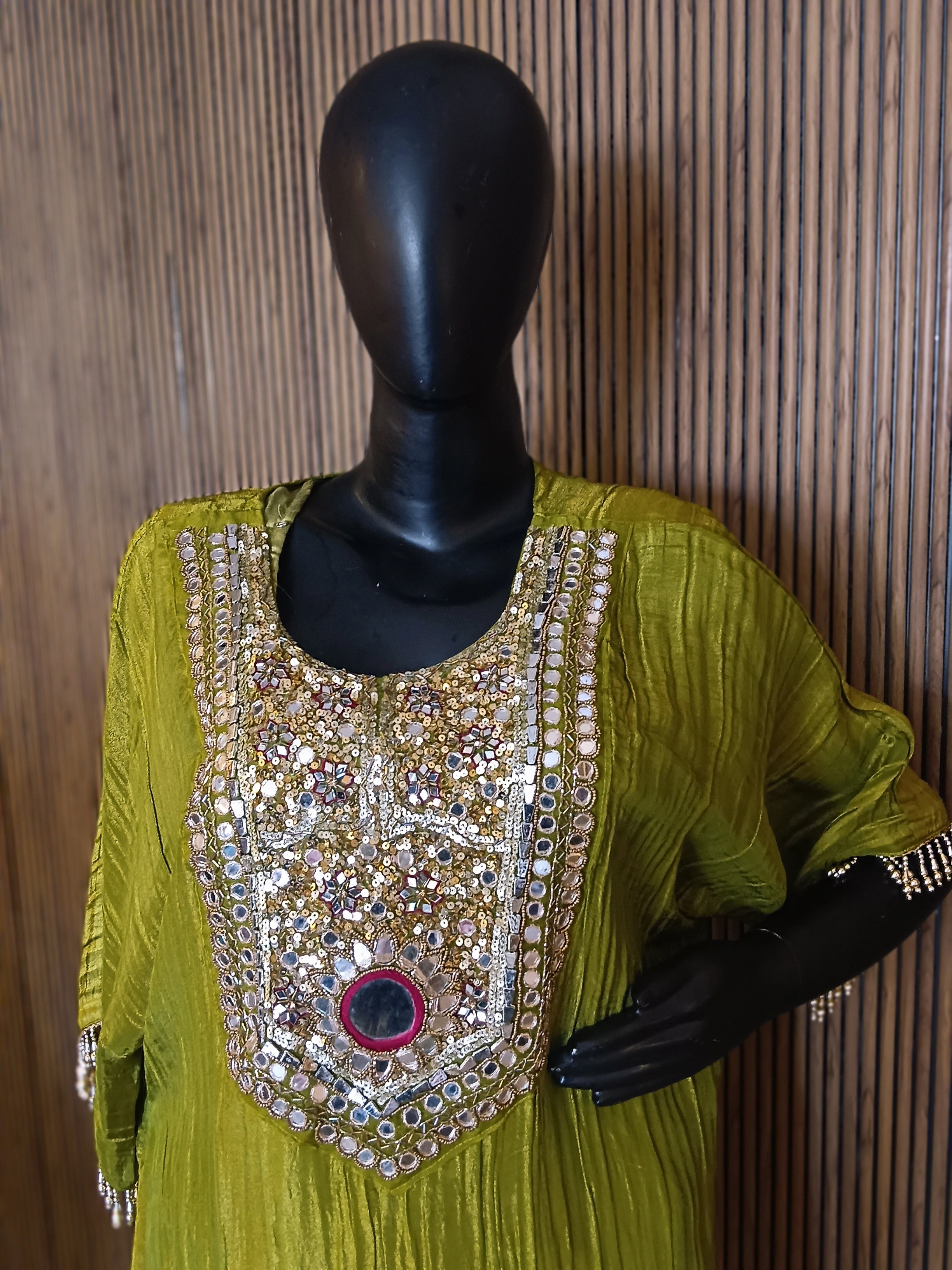 Olive Green Ethnic Kurti Made From Crinkle-Texture Fabric, Featuring Lavish Mirror And Sequin Embroidery On The Yoke