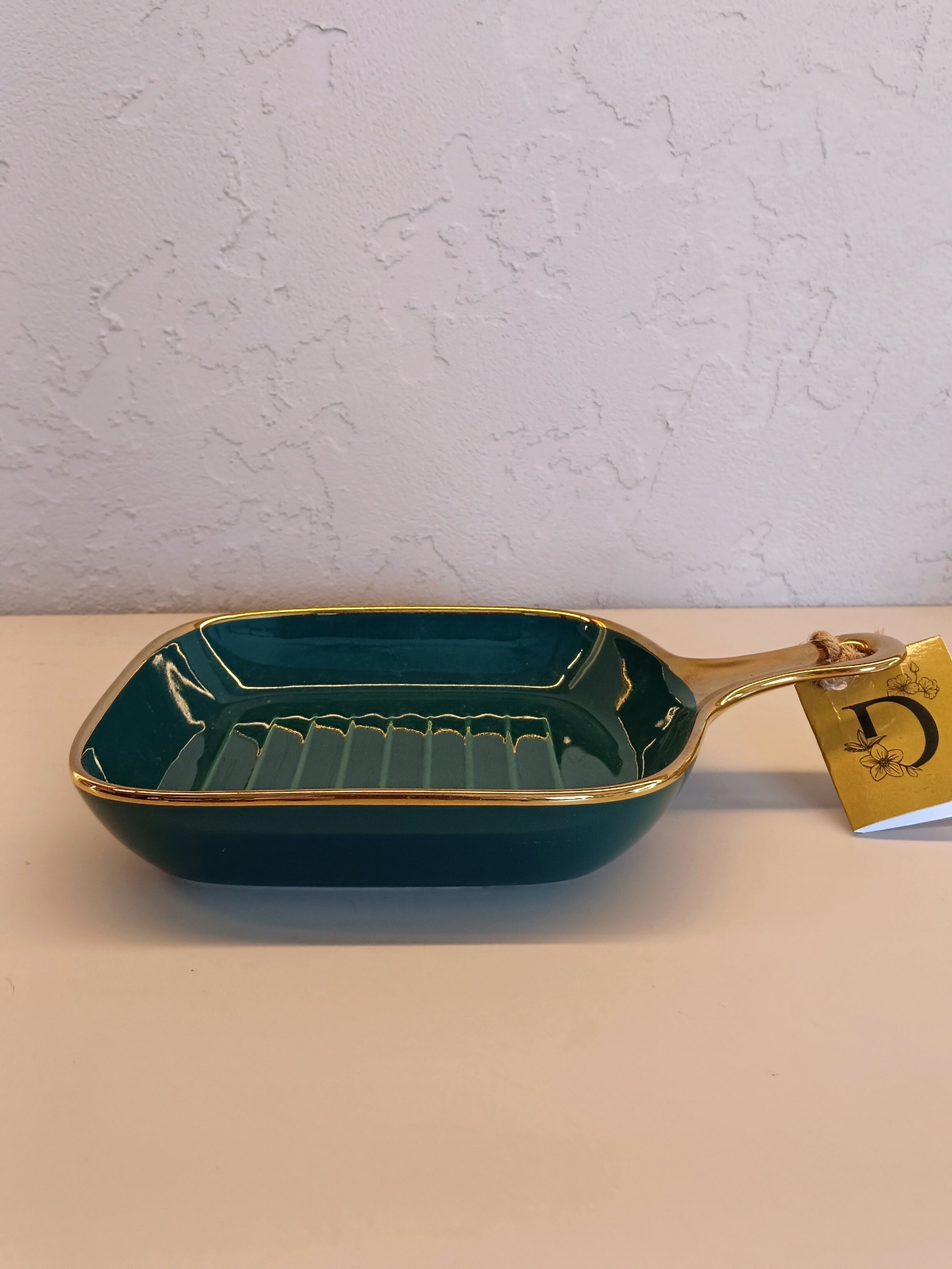 Stylish Ceramic Grill Pan In Deep Green With A Golden Rim And Handle