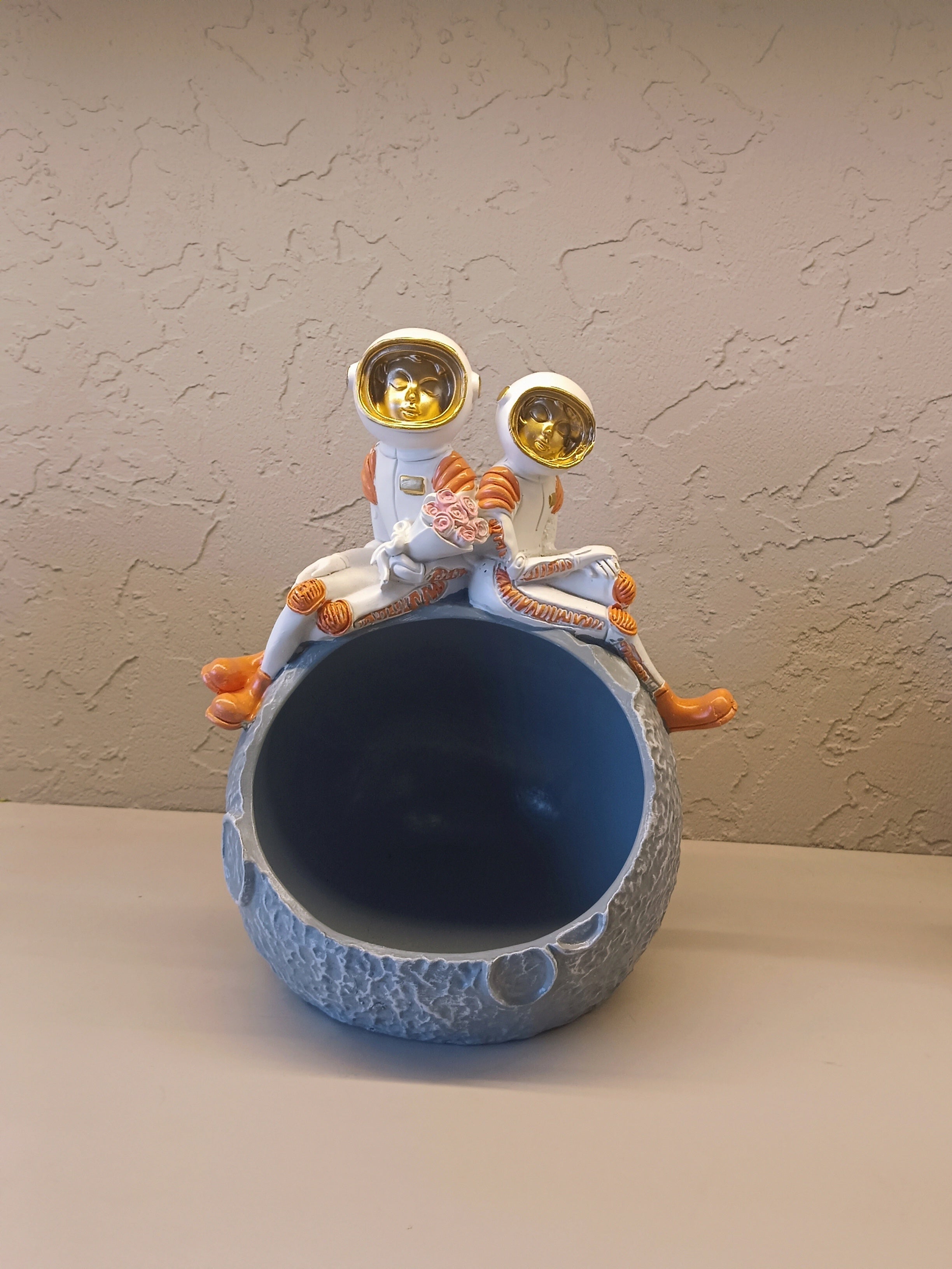 Decorative Figurine Featuring Two Astronauts In White Suits With Golden Visors