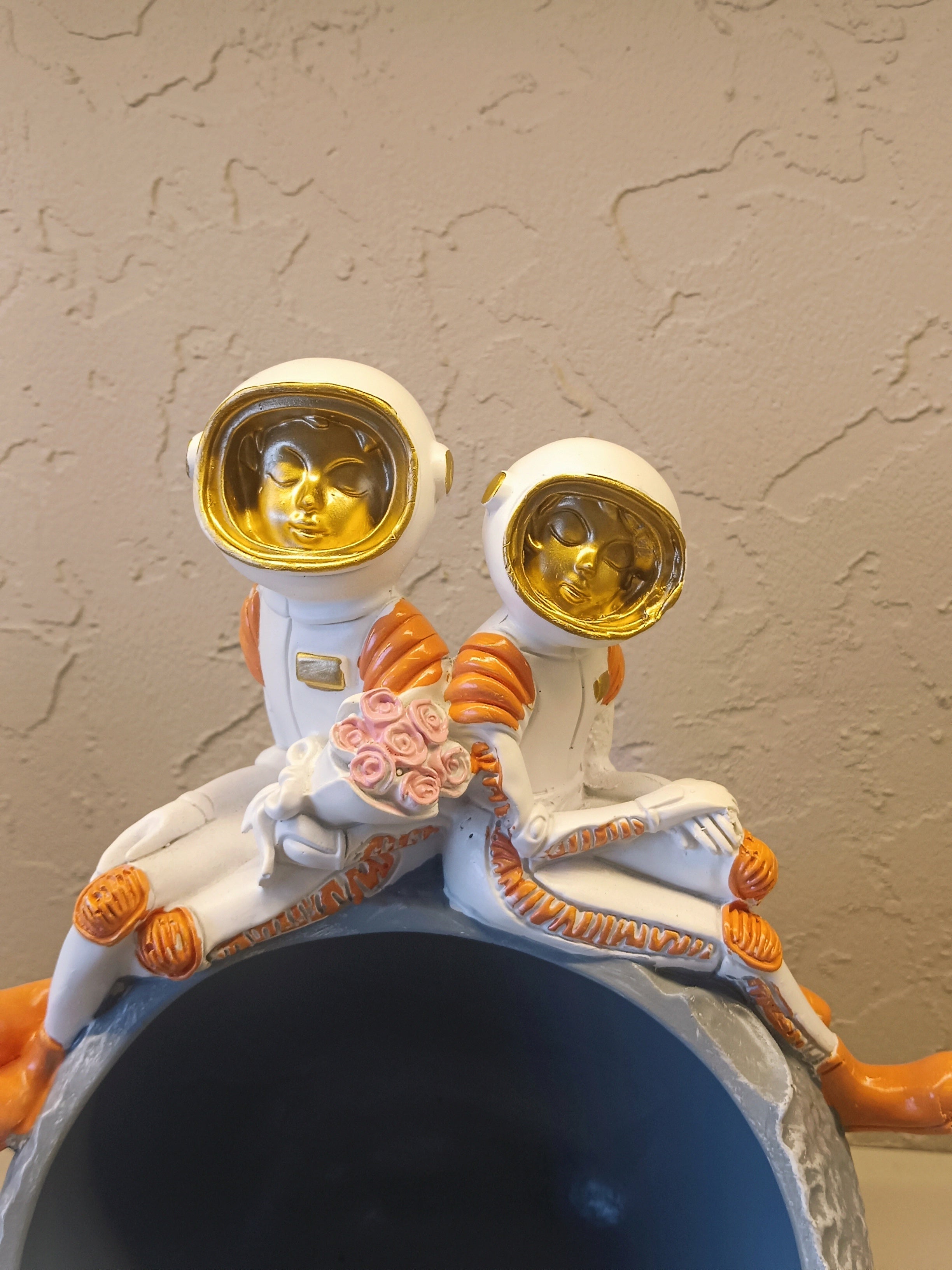 Decorative Figurine Featuring Two Astronauts In White Suits With Golden Visors
