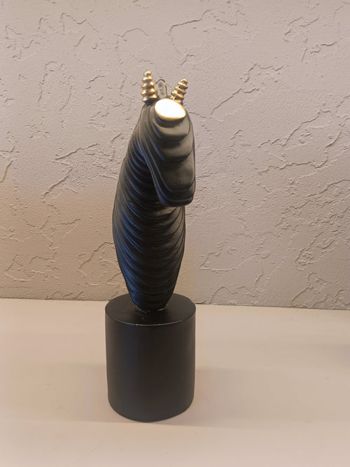 A Contemporary Abstract Horse Head Sculpture In Matte Black With Ribbed Detailing