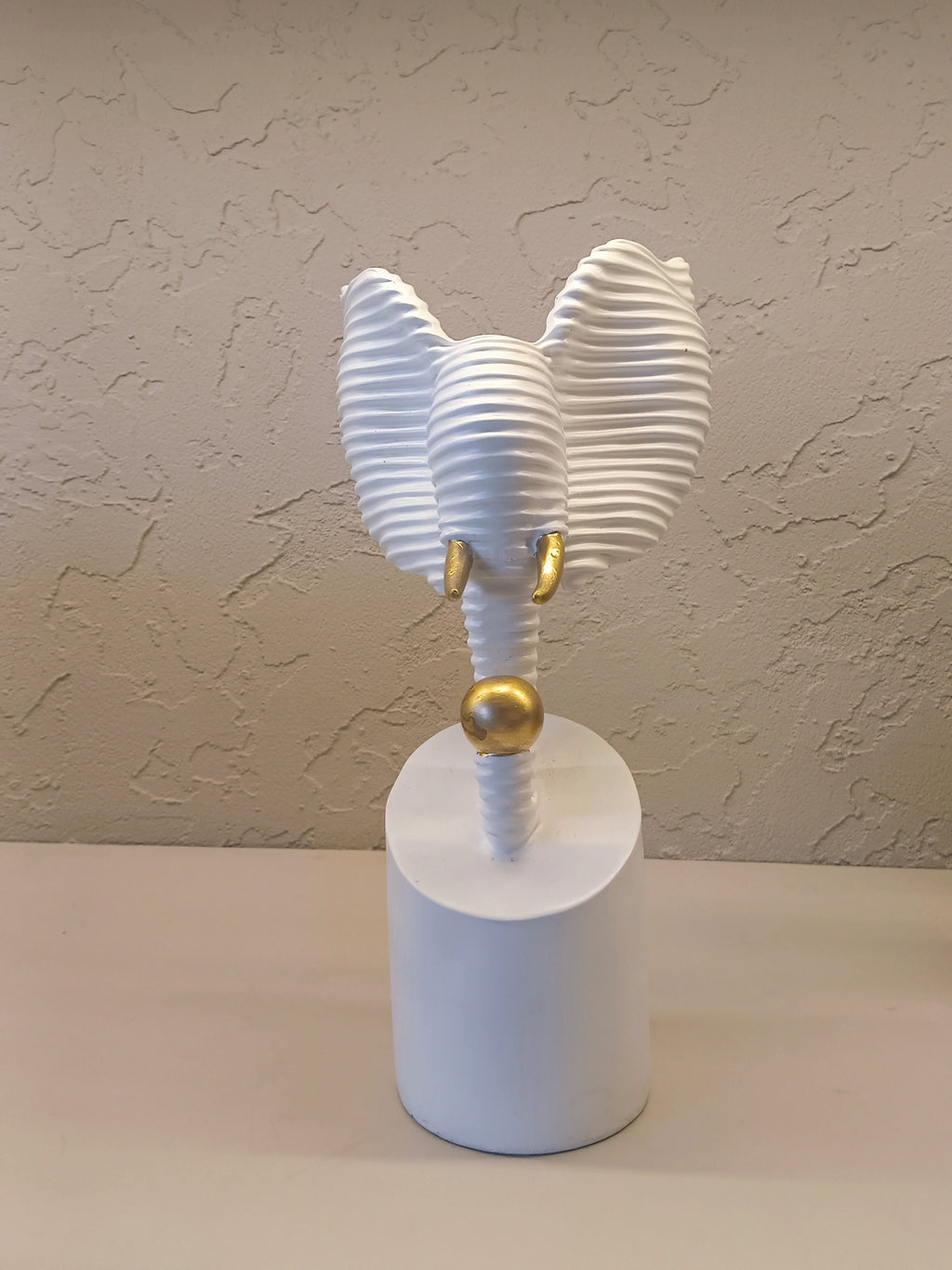 Modern Abstract Sculpture of An Elephant Head Crafted in A Ribbed White Finish
