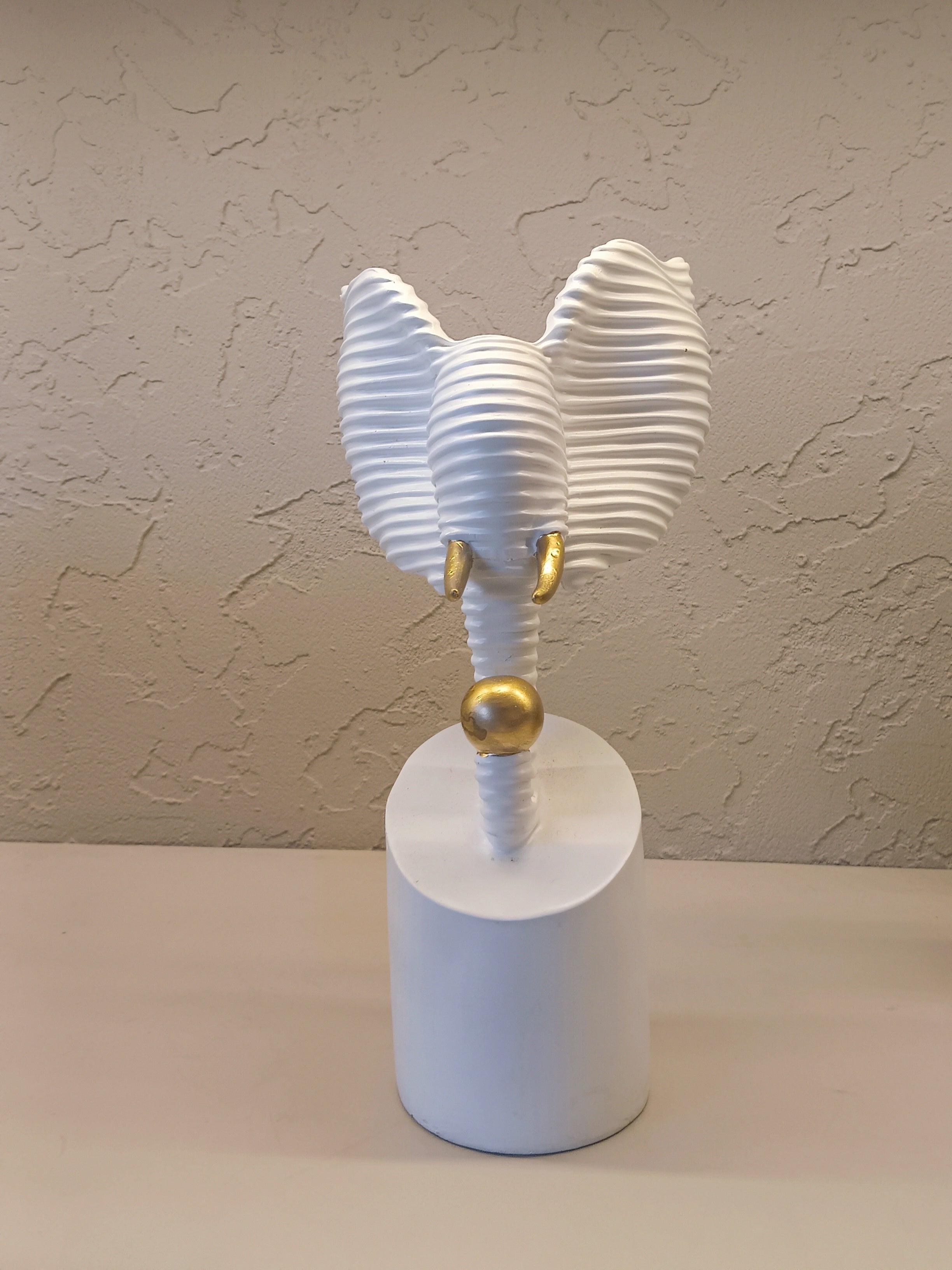 Modern Abstract Sculpture of An Elephant Head Crafted in A Ribbed White Finish