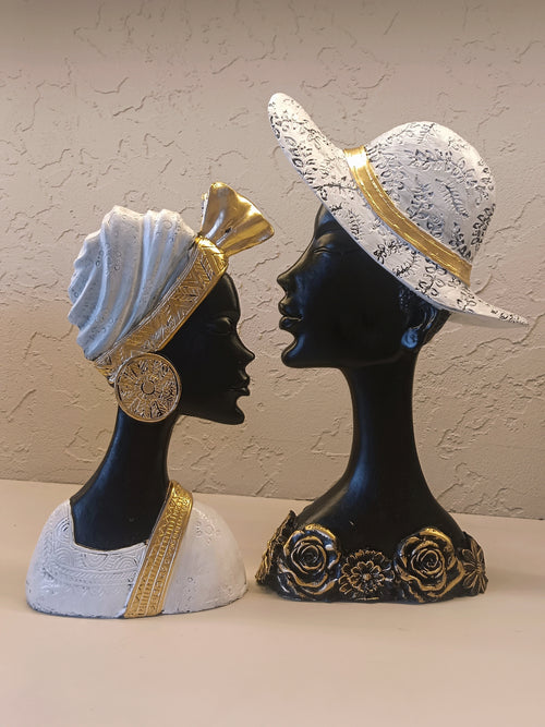 A Beautifully Crafted Pair Of Decorative Bust Sculptures Depicting Elegant African-Inspired Figures