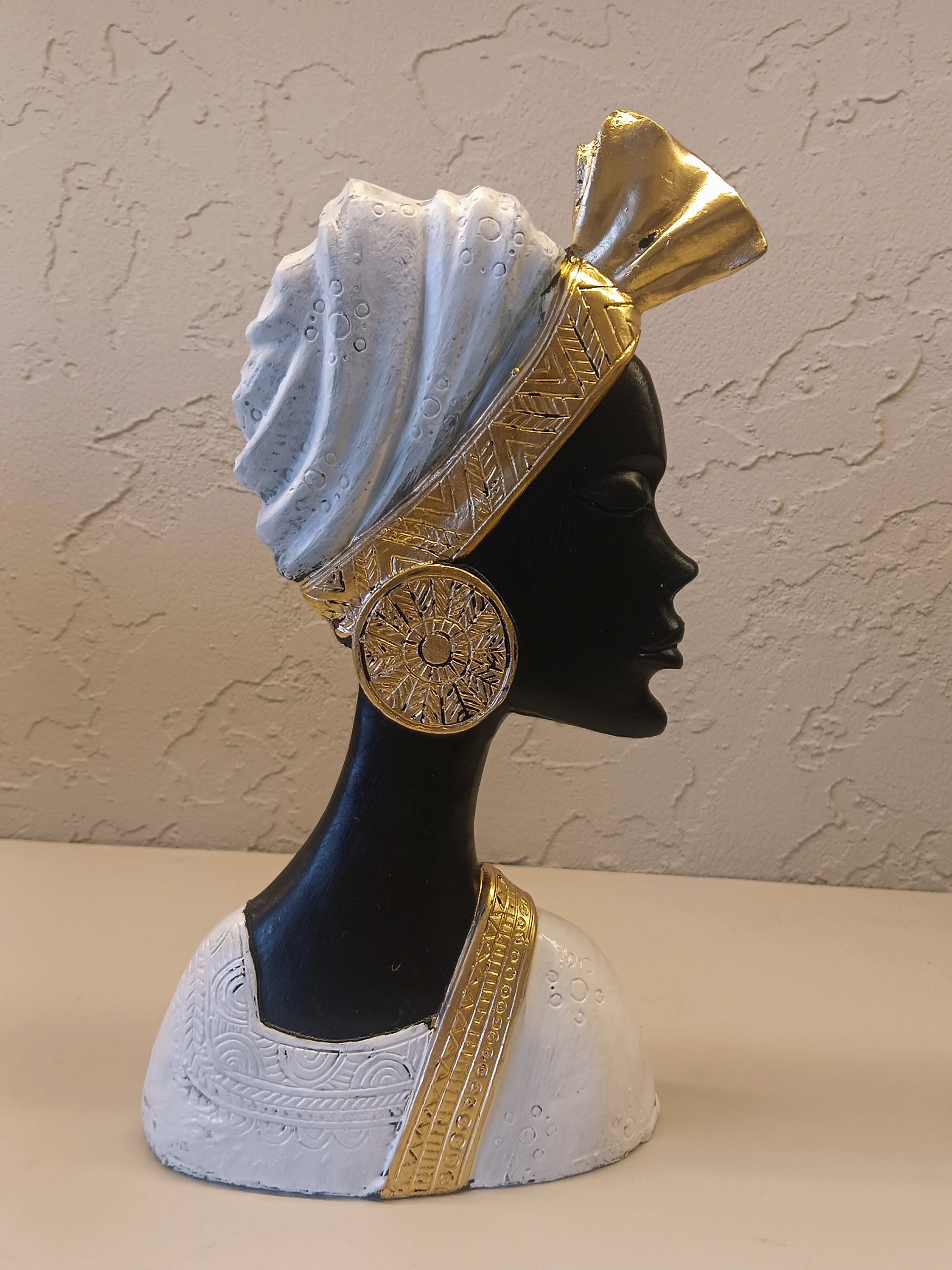 A Beautifully Crafted Pair Of Decorative Bust Sculptures Depicting Elegant African-Inspired Figures
