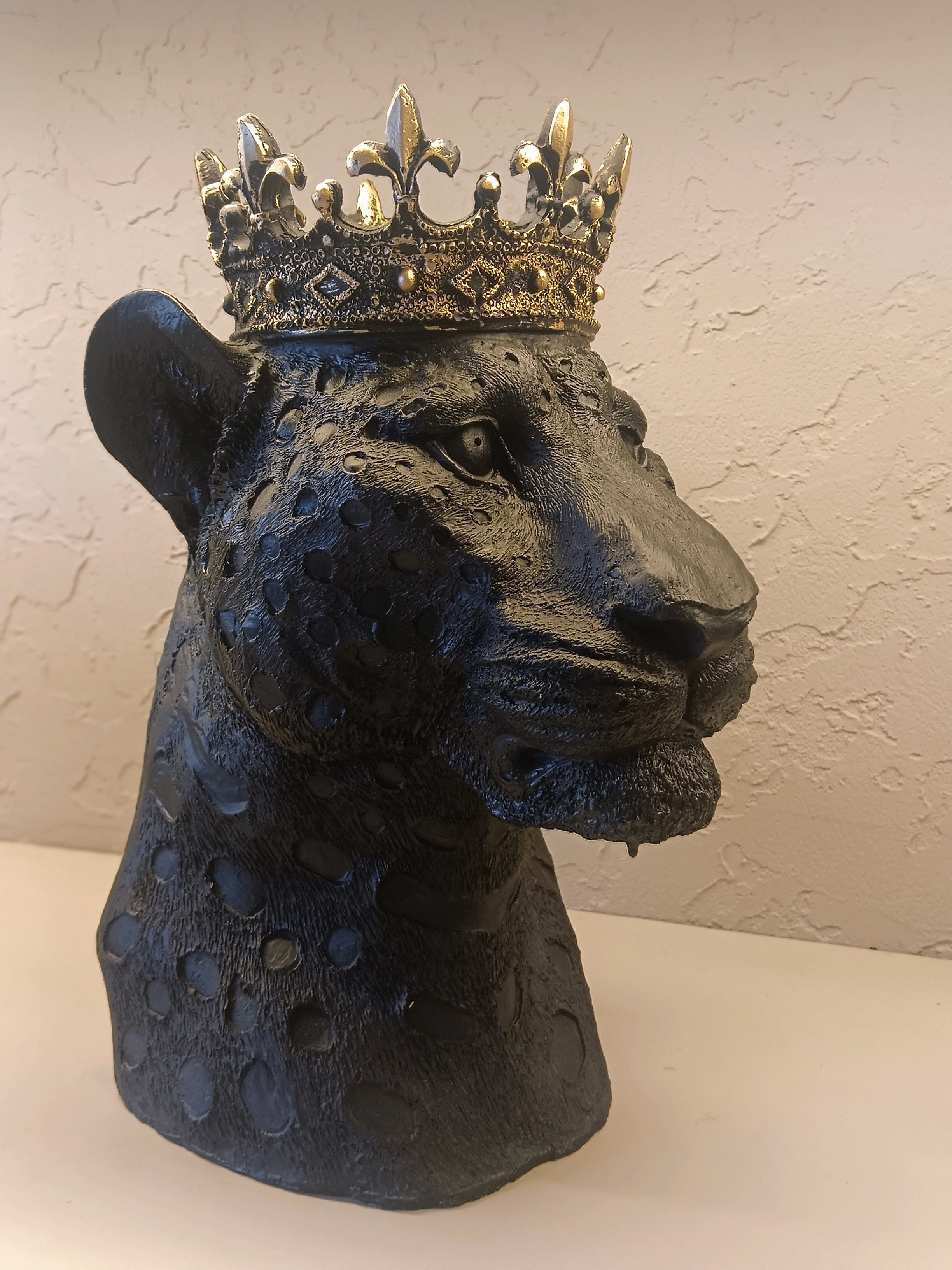 A Majestic Decorative Leopard Bust Sculpture Crowned With An Ornate Golden Crown